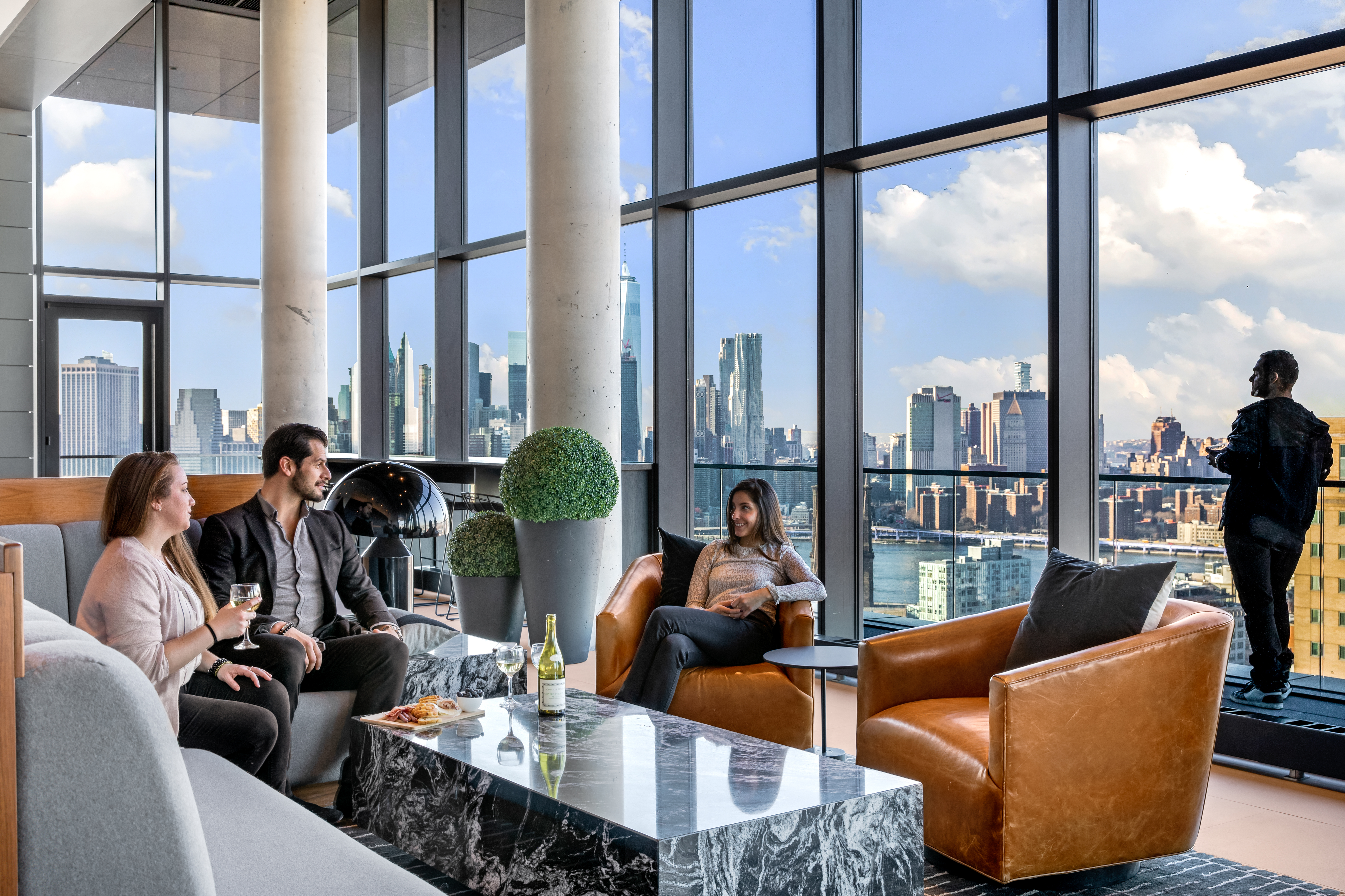 120 Nassau Street, Unit 12K Brooklyn, NY 11201 - Photo 9 of 10 a living room with furniture city view and a large window