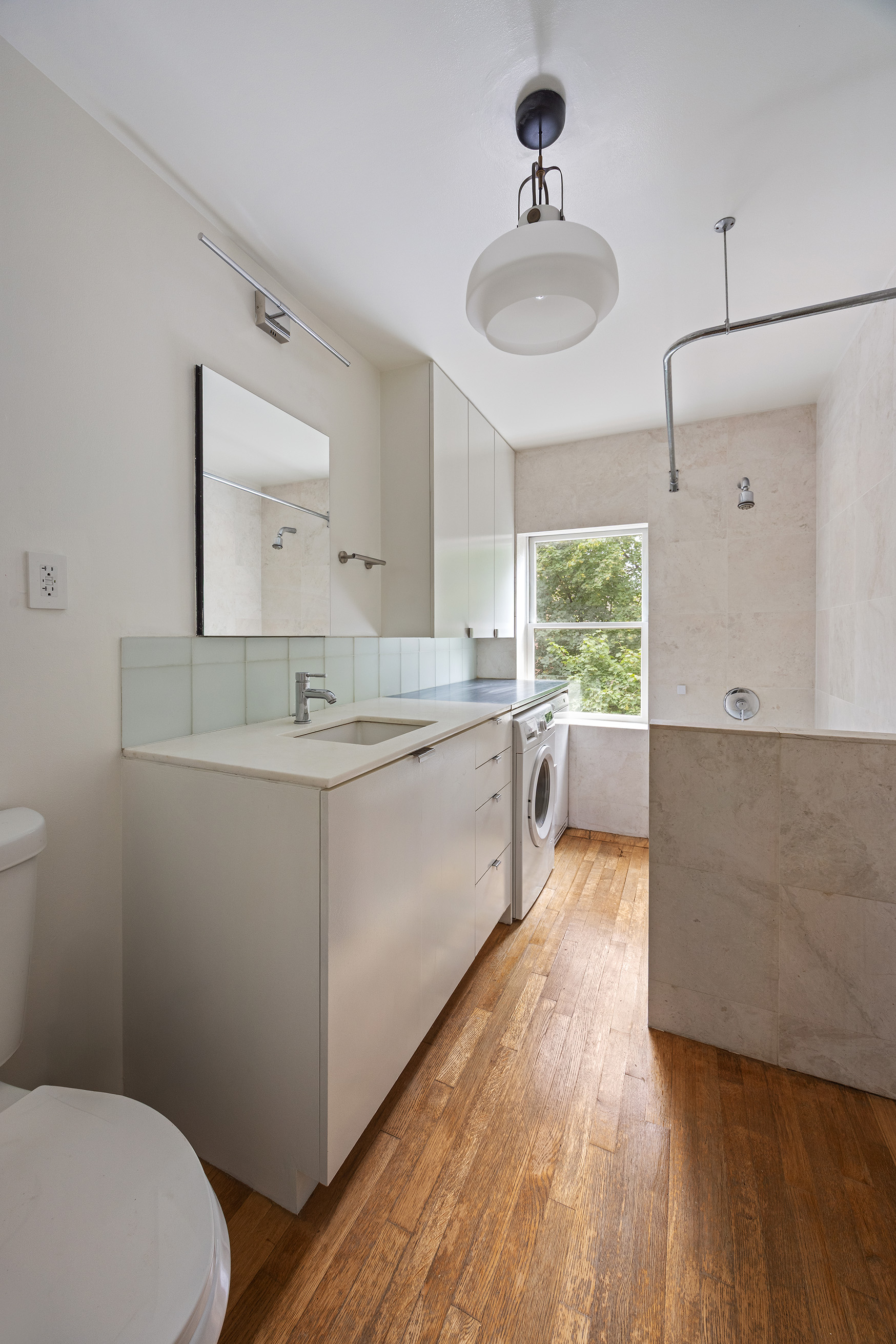 64 Clifton Place, Unit 2 Brooklyn, NY 11238 - Photo 14 of 16 a view of a kitchen with a sink dishwasher a refrigerator with wooden floor