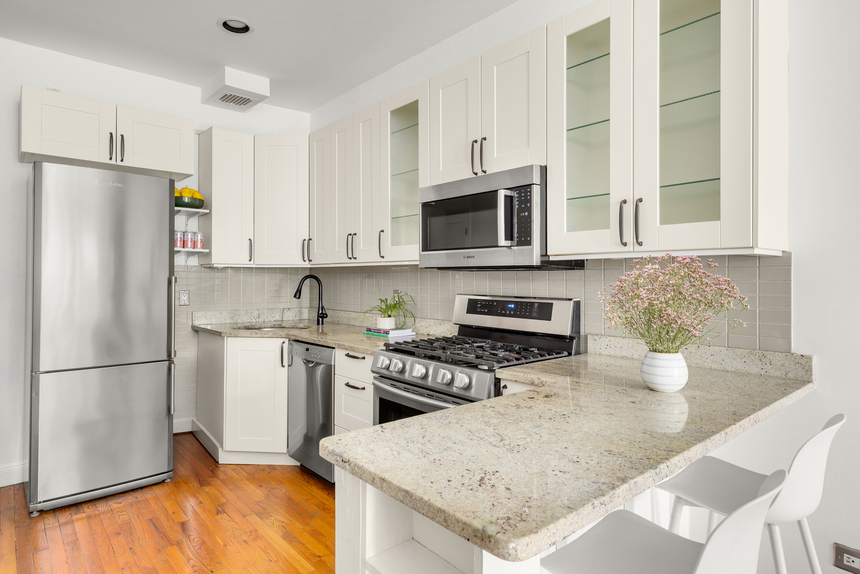 315 3rd Street, Unit 2A Brooklyn, NY 11215 - Photo 3 of 8 a kitchen with stainless steel appliances granite countertop a refrigerator stove microwave and sink
