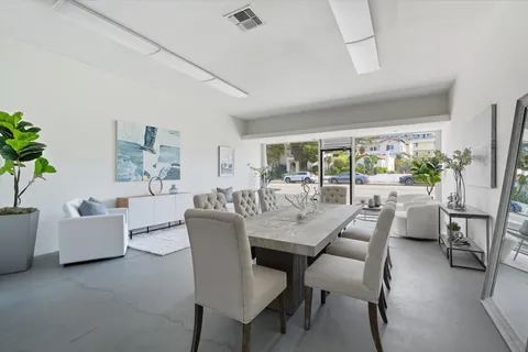 a view of a hallway with the glass door
