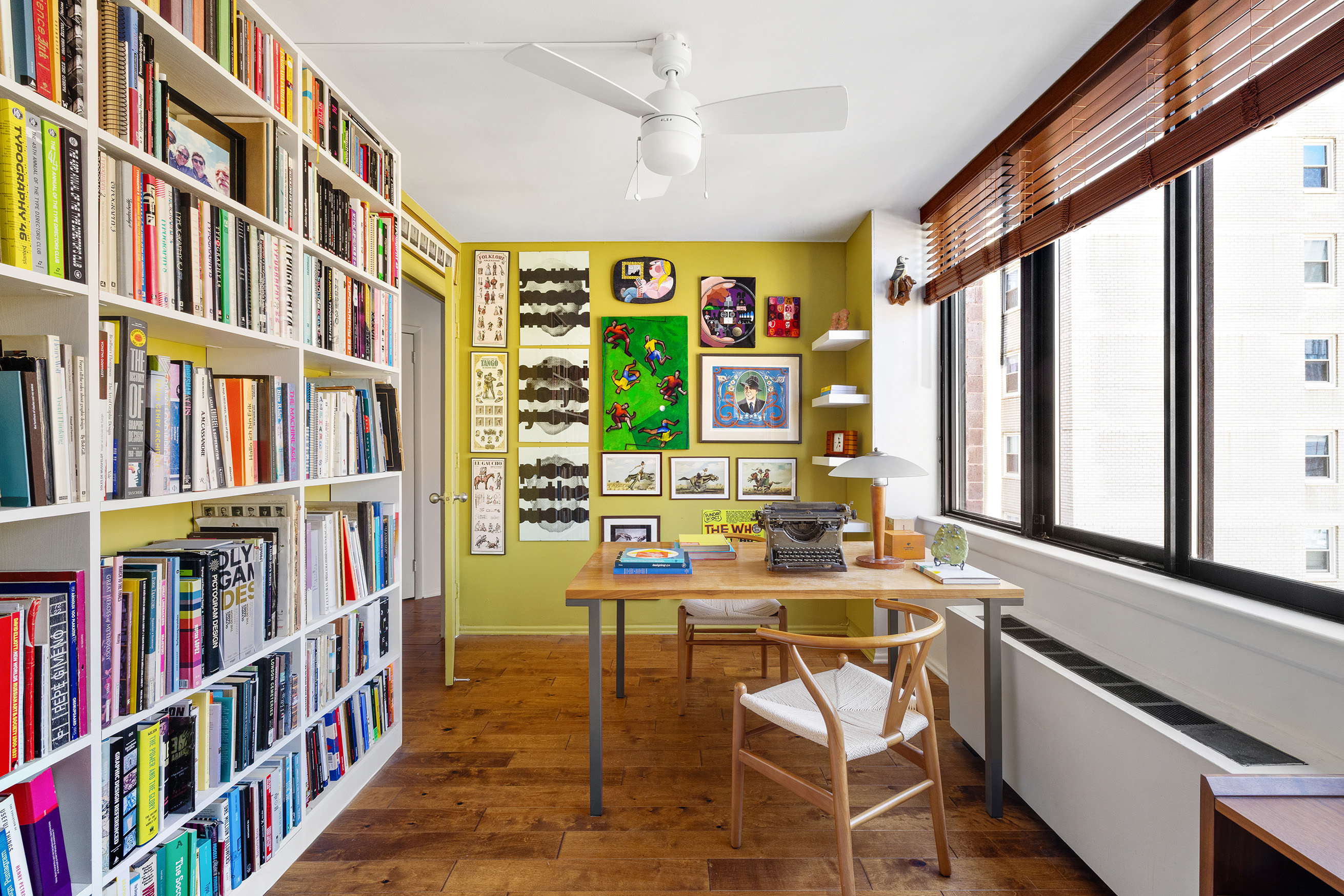455 East 86th Street, Unit 11A Manhattan, NY 10028 - Photo 8 of 11 a reading room with furniture book shelf and a large window