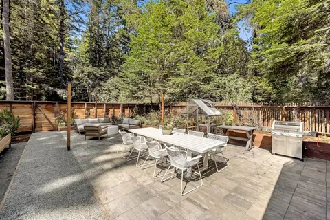 a view of a patio with swimming pool