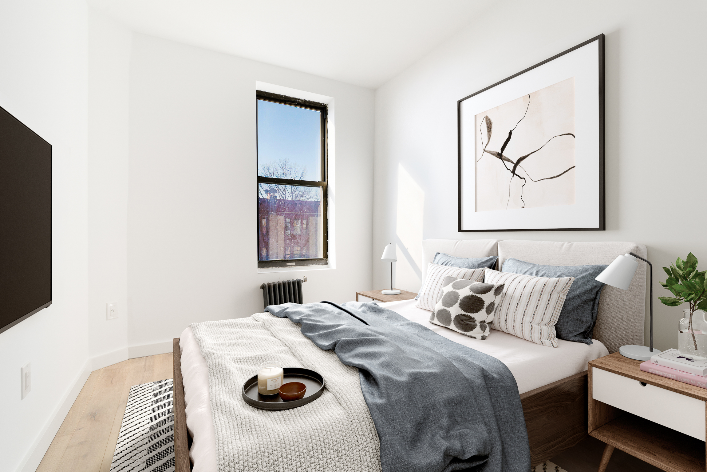 625 Park Place, Unit 3A Brooklyn, NY 11238 - Photo 4 of 9 a bedroom with a bed and a painting on the wall