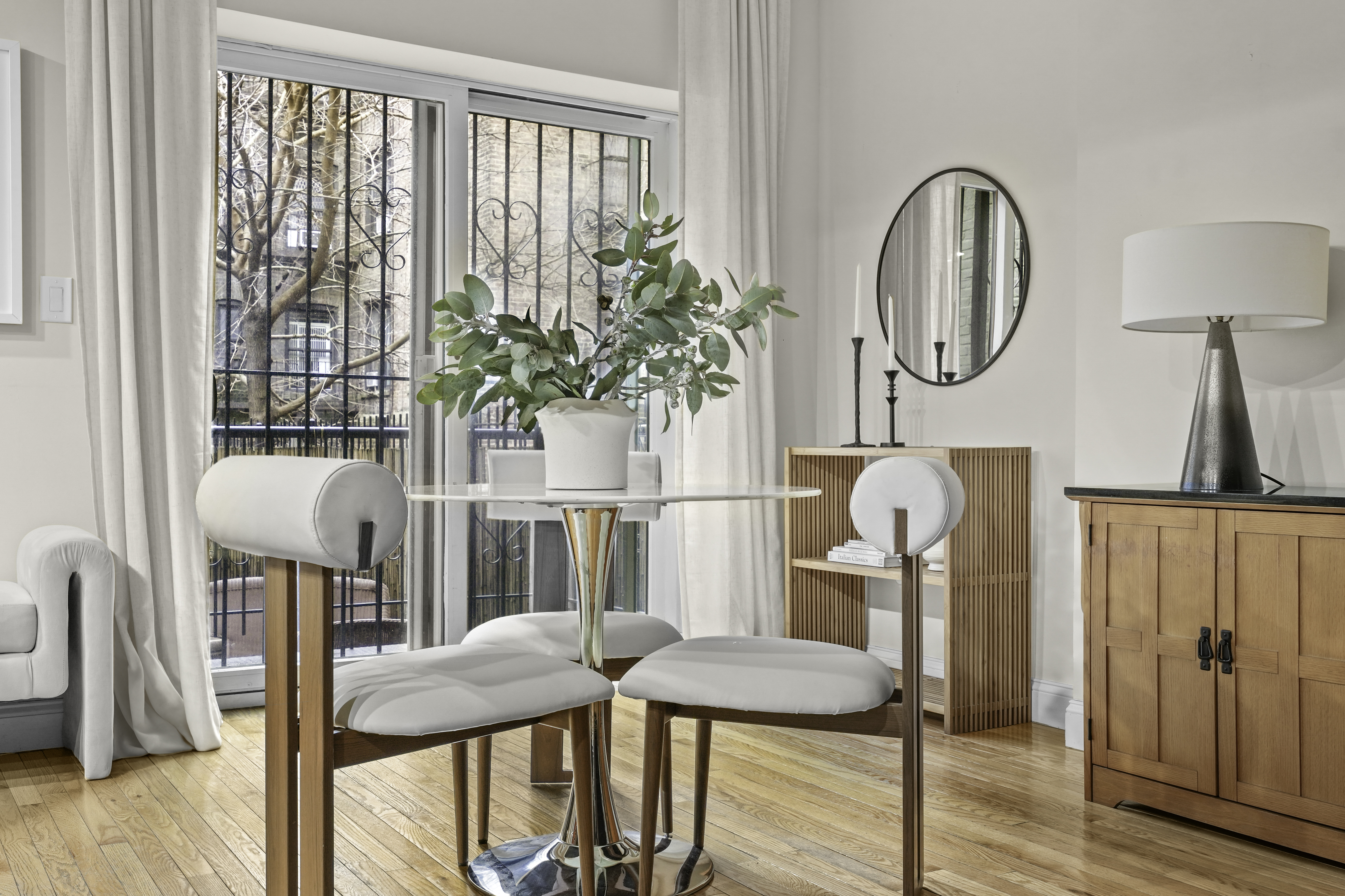 714 St Nicholas Avenue, Unit 1 Manhattan, NY 10031 - Photo 4 of 18 a view of a living room and dining room