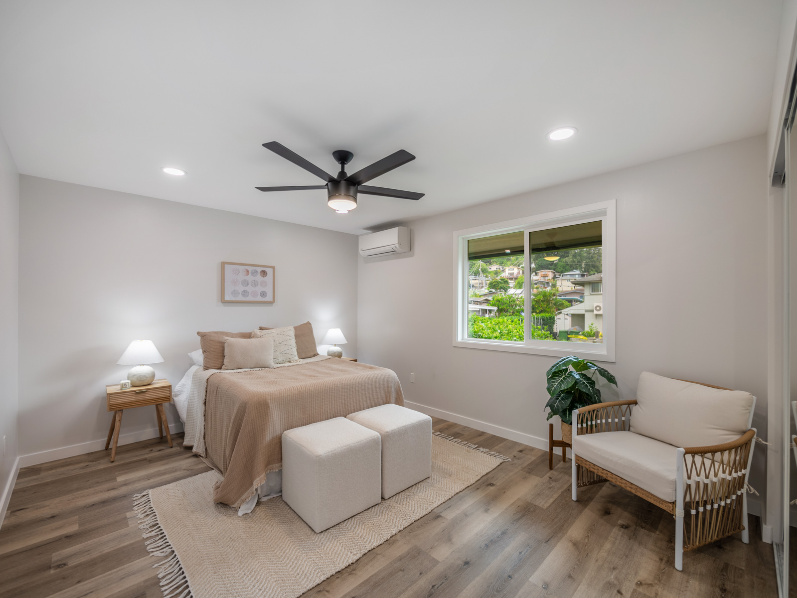 45-561 Paleka Road, Unit C Kaneohe, HI 96744 - Photo 18 of 27 a living room with a bed furniture and a window