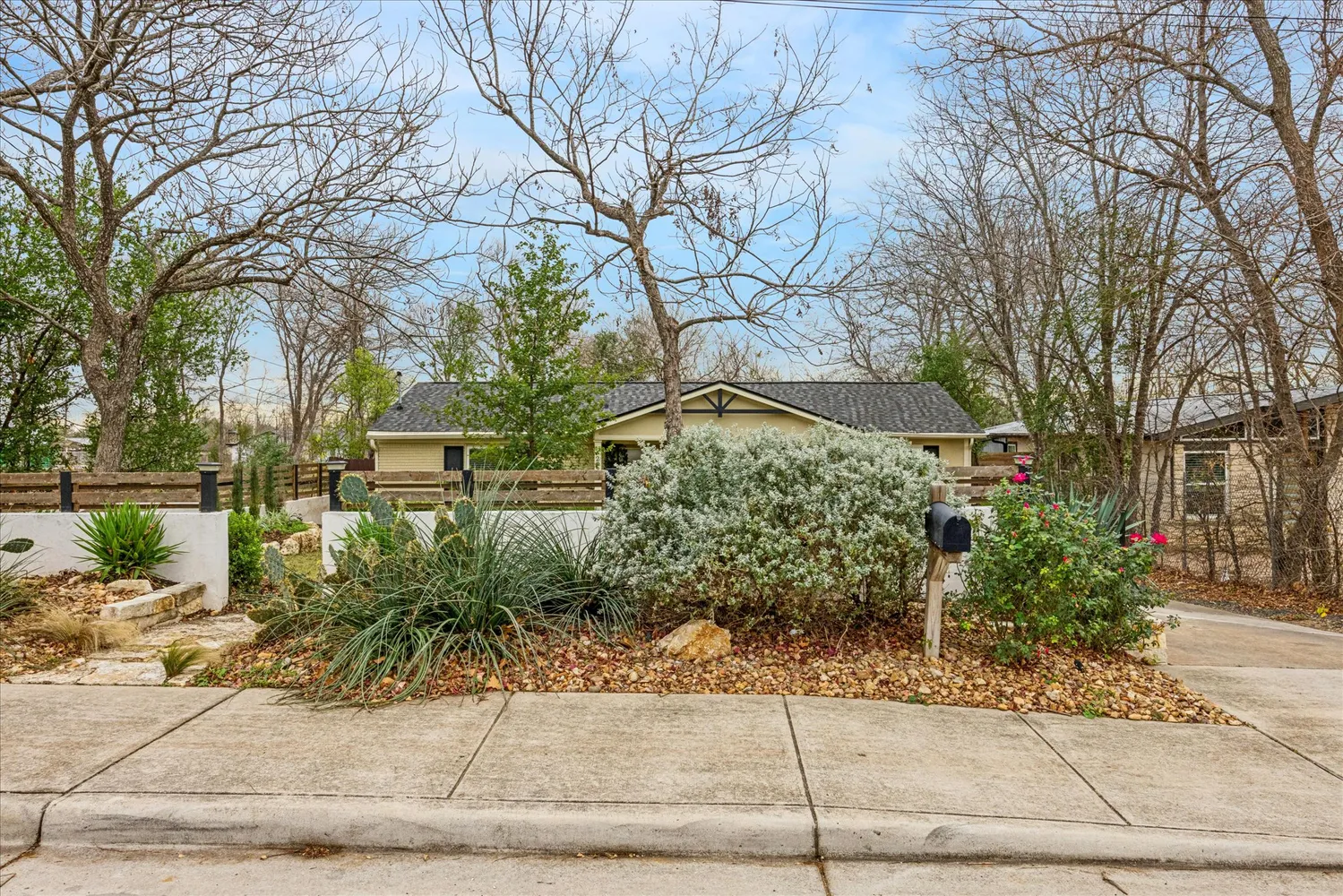 front view of a house with a yard