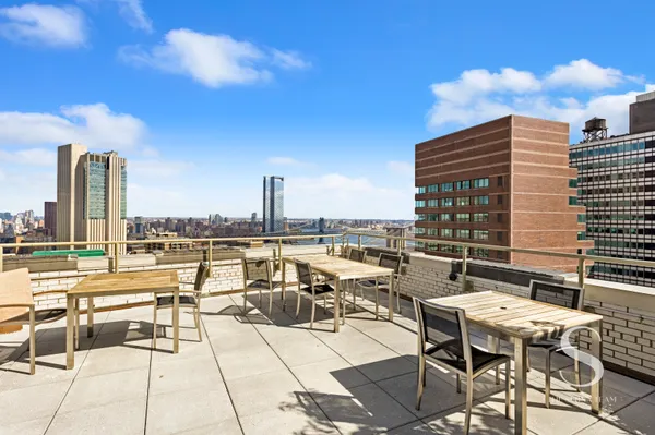 a view of balcony with patio and outdoor seating