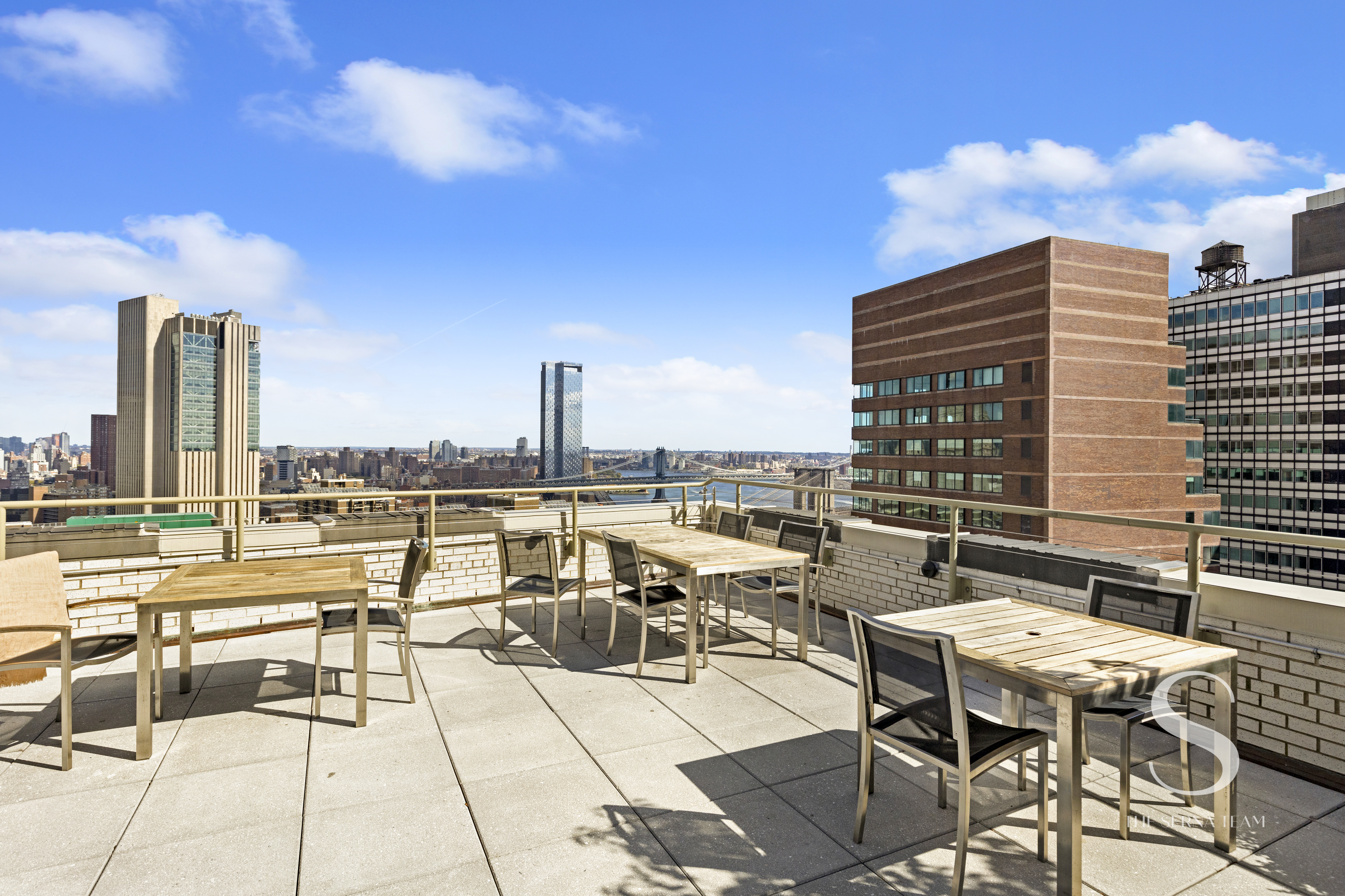 99 John Street, Unit 910 Manhattan, NY 10038 - Photo 9 of 11 a view of balcony with patio and outdoor seating