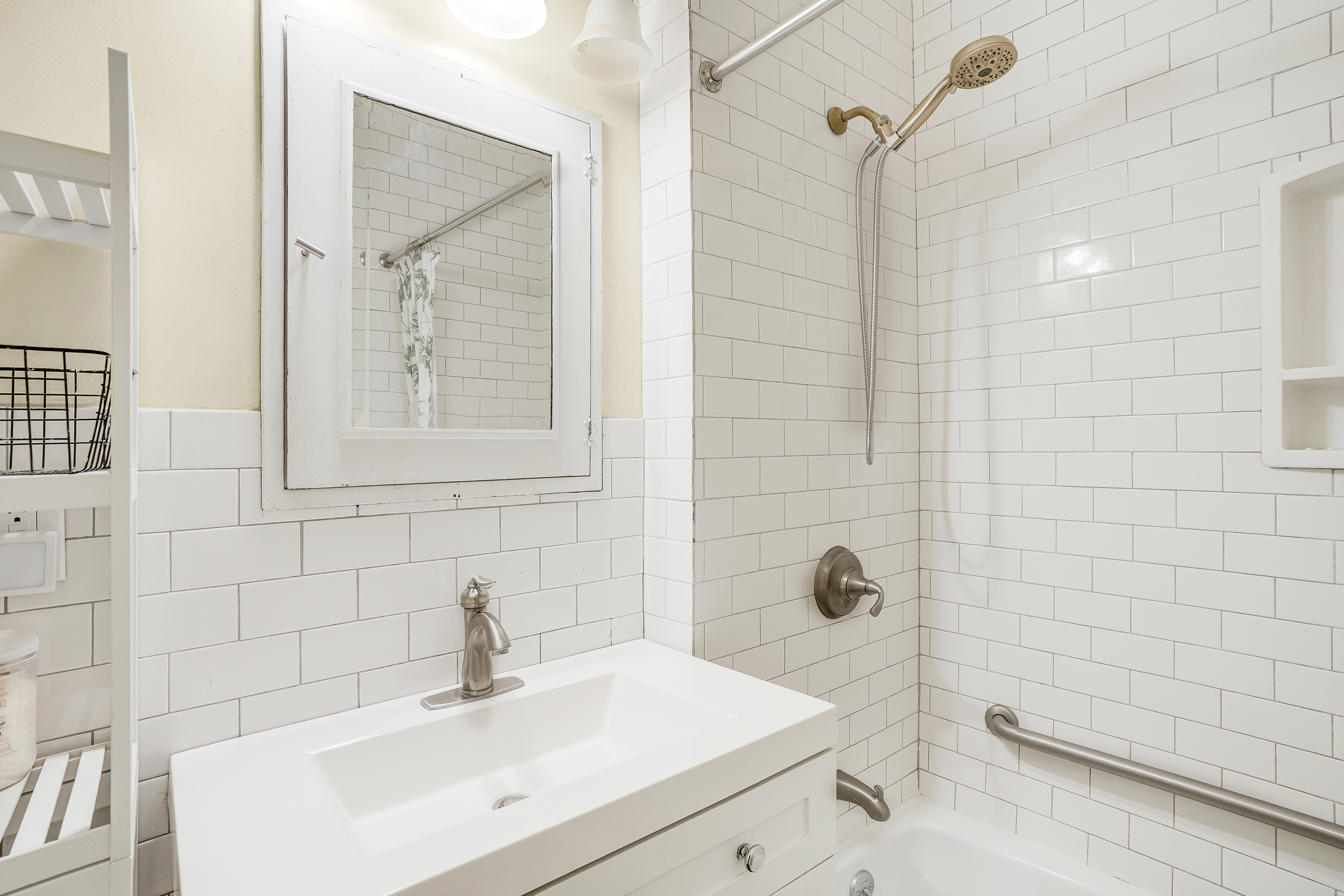 205 Edgecombe Avenue Manhattan, NY 10030 - Photo 17 of 21 a bathroom with a sink a toilet and shower