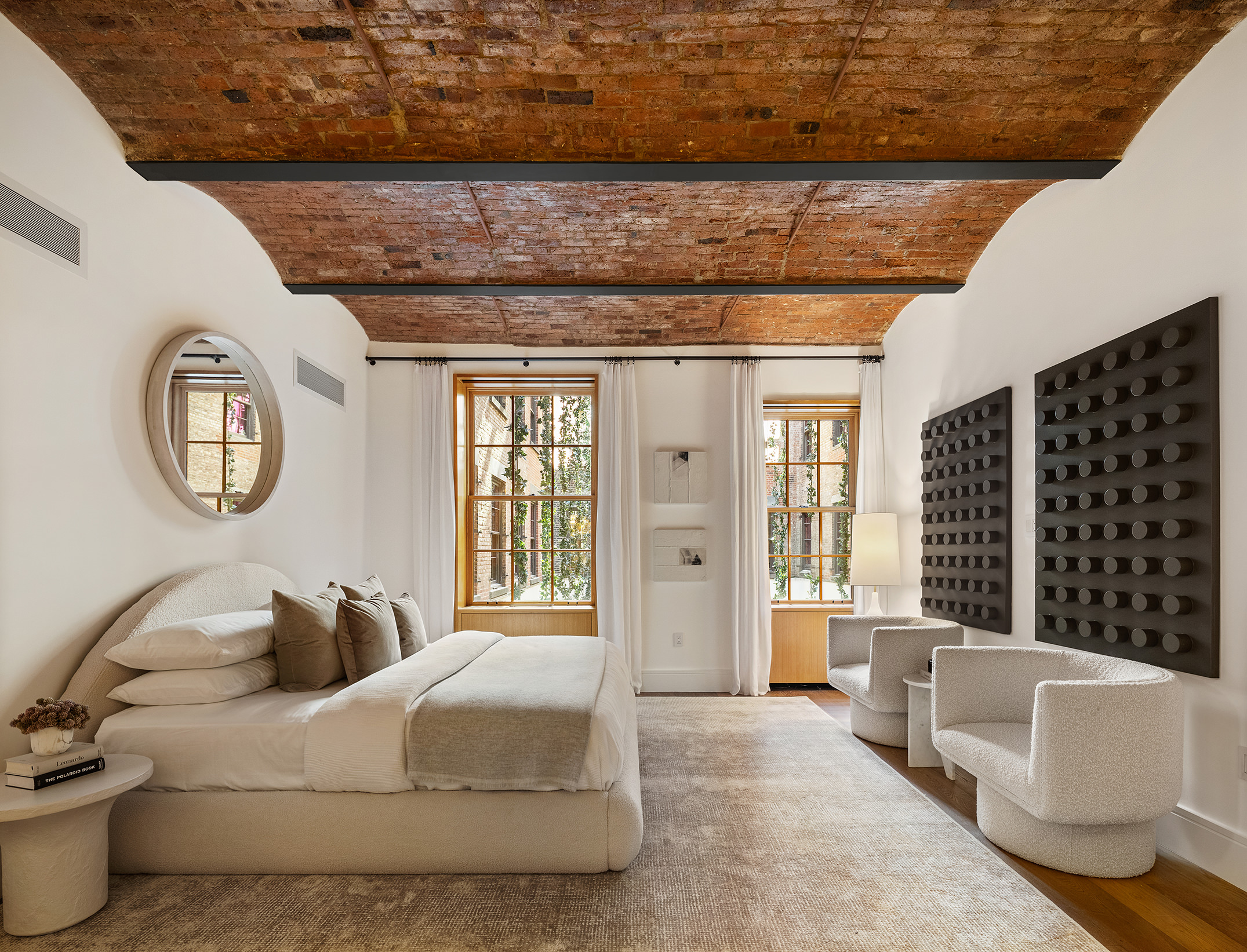 36 Bleecker Street, Unit 3DC Manhattan, NY 10012 - Photo 6 of 30 a spacious bedroom with a bed a mirror and a window