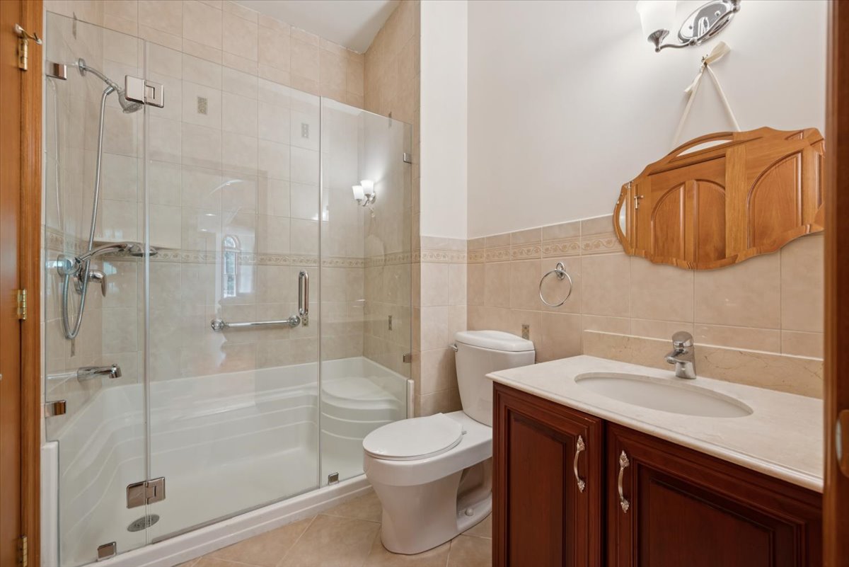 115 Skyline Drive Watchung, NJ 07069 - Photo 19 of 95 a bathroom with a sink a toilet and shower