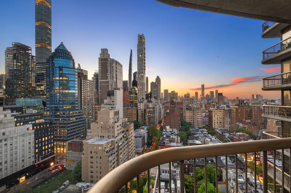 167 East 61st Street, Unit 21B Manhattan, NY 10065 - Photo 3 of 12 a view of a city from a balcony