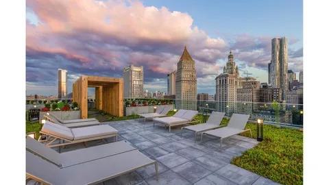 a building outdoor space with patio furniture