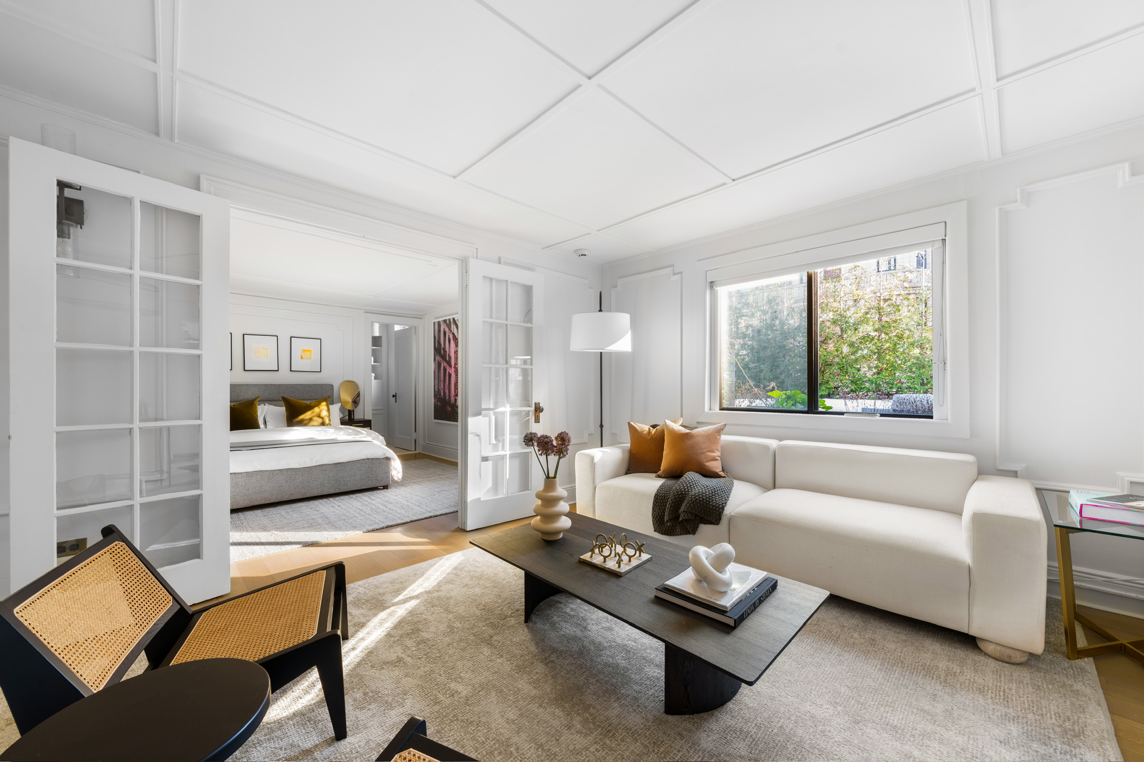 1200 Broadway, Unit PH89 Manhattan, NY 10001 - Photo 42 of 47 a living room with furniture and a window