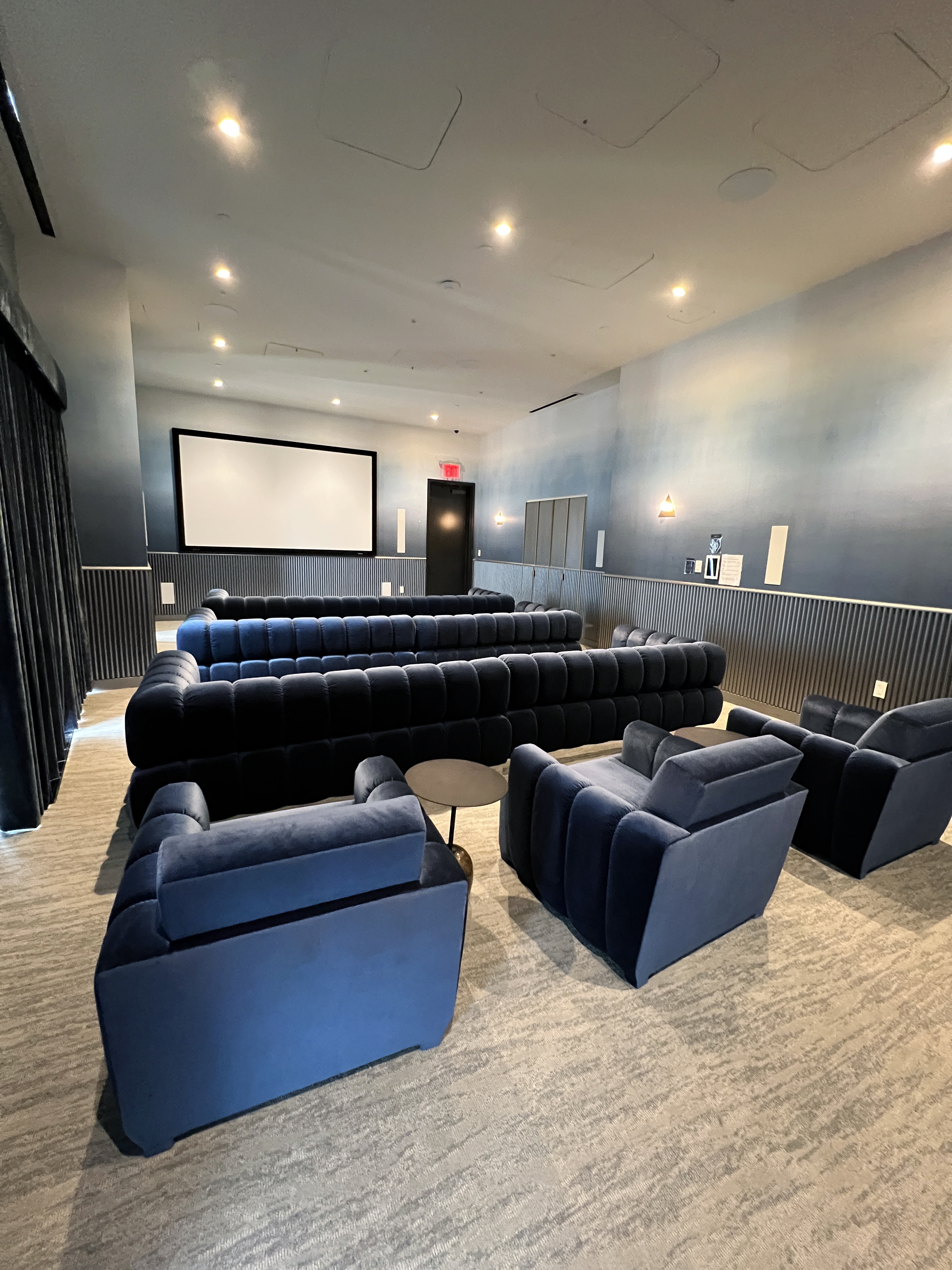 11 Hoyt Street, Unit 10M Brooklyn, NY 11201 - Photo 14 of 24 a living room with furniture and a flat screen tv