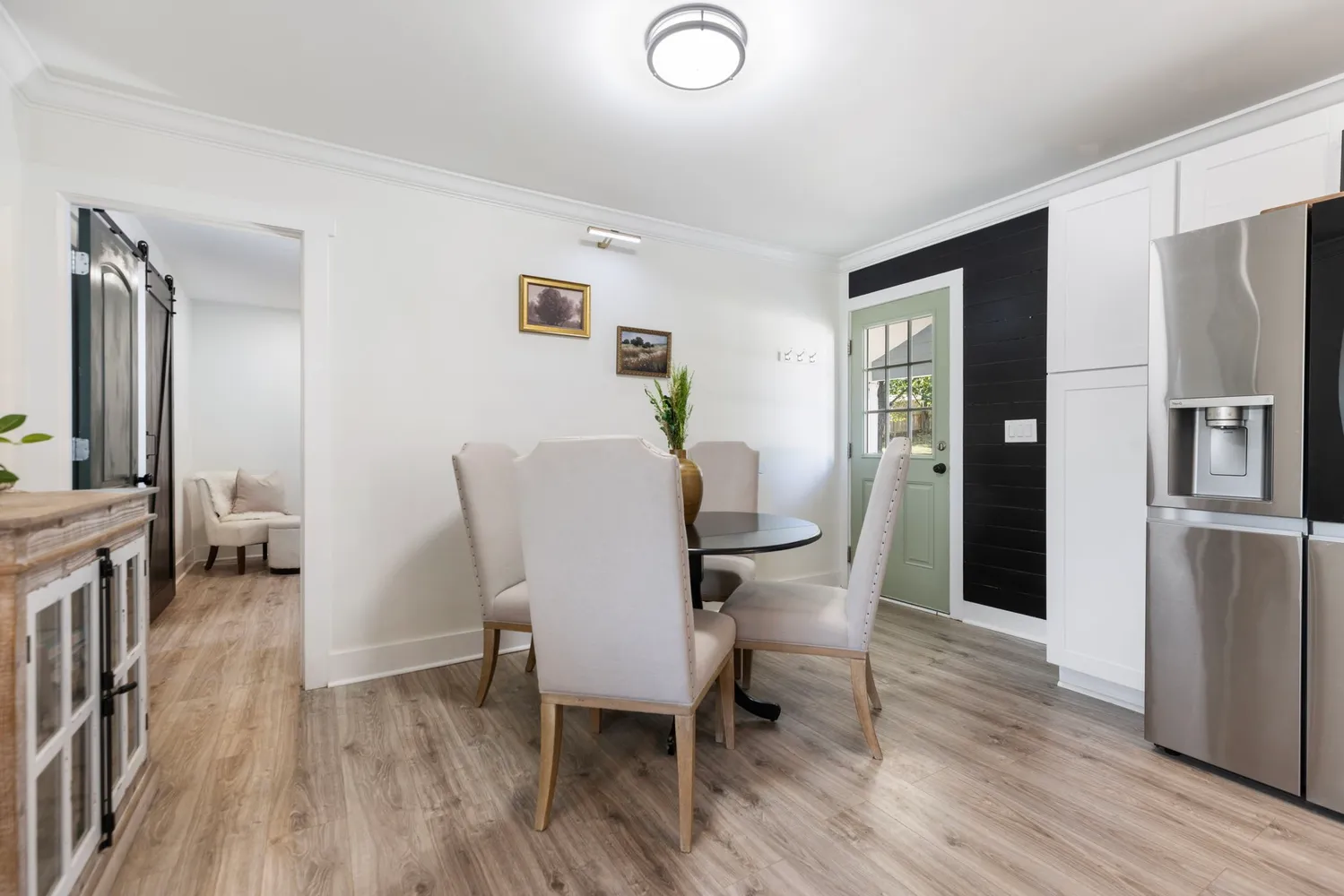 a large white bed in a white room