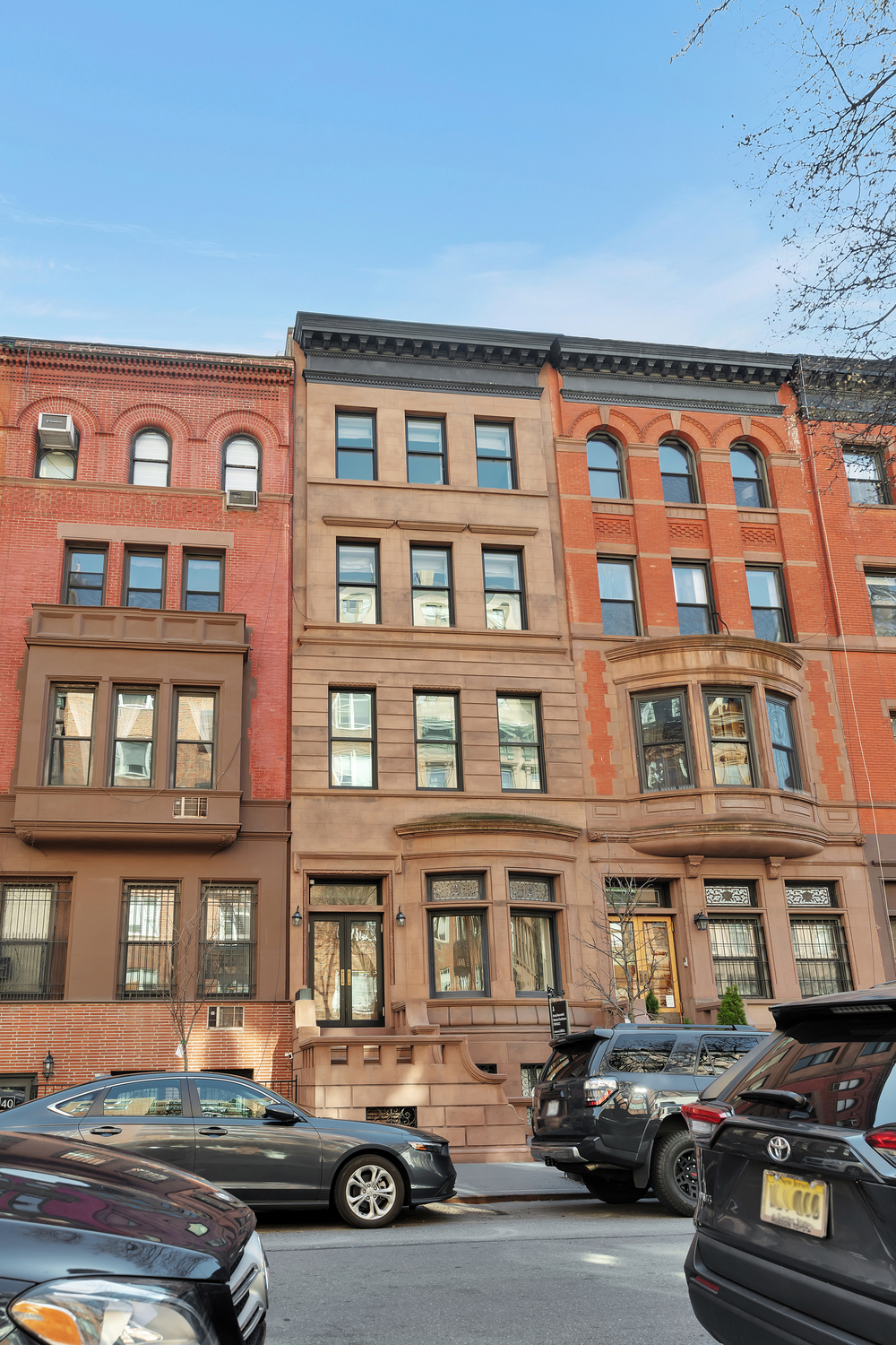 42 West 71st Street Manhattan, NY 10023 - Photo 34 of 35 a couple of cars parked in front of a building
