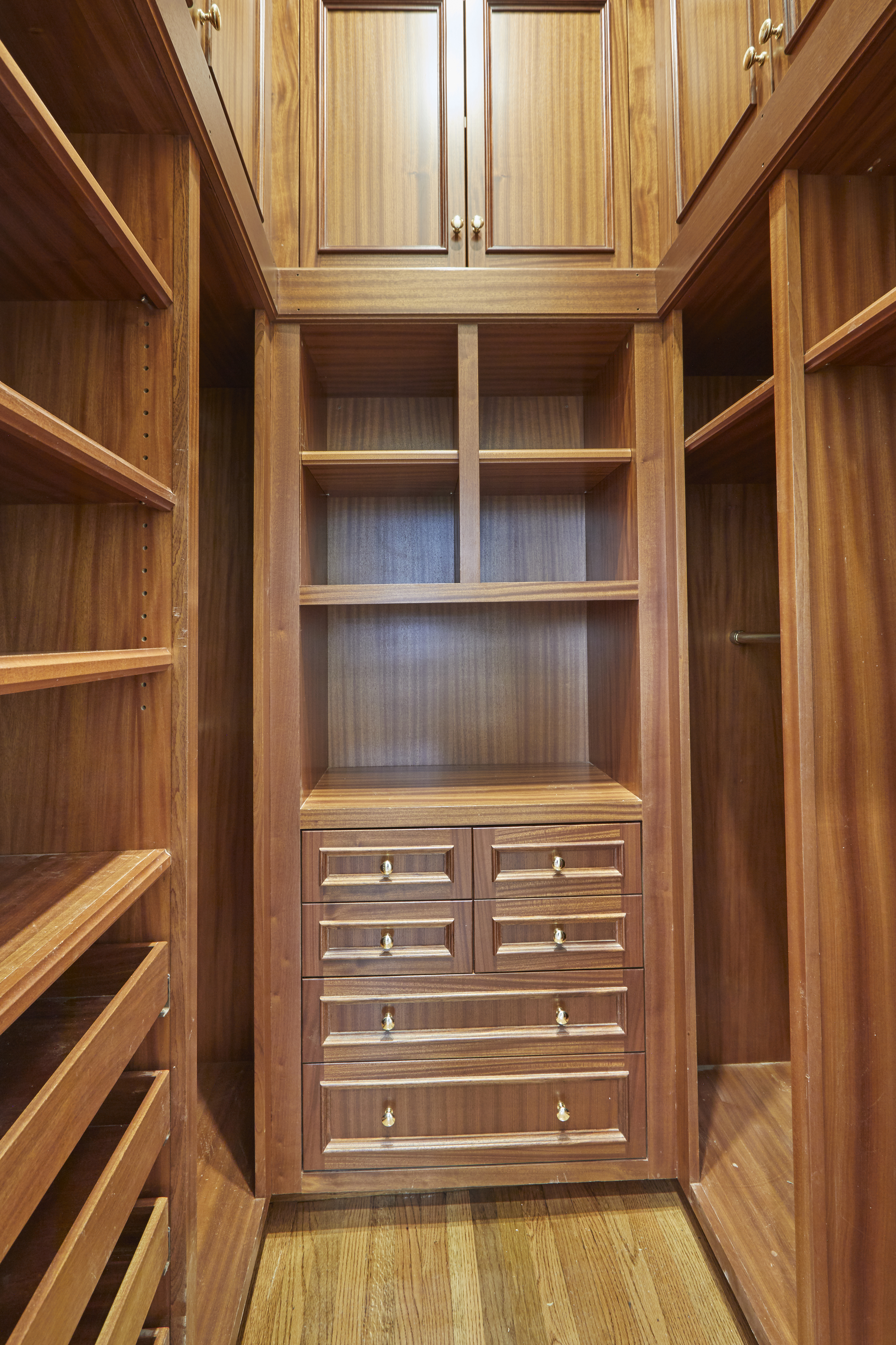 157 East 75th Street, Unit 1E Manhattan, NY 10021 - Photo 8 of 21 a view of walk in closet with empty racks