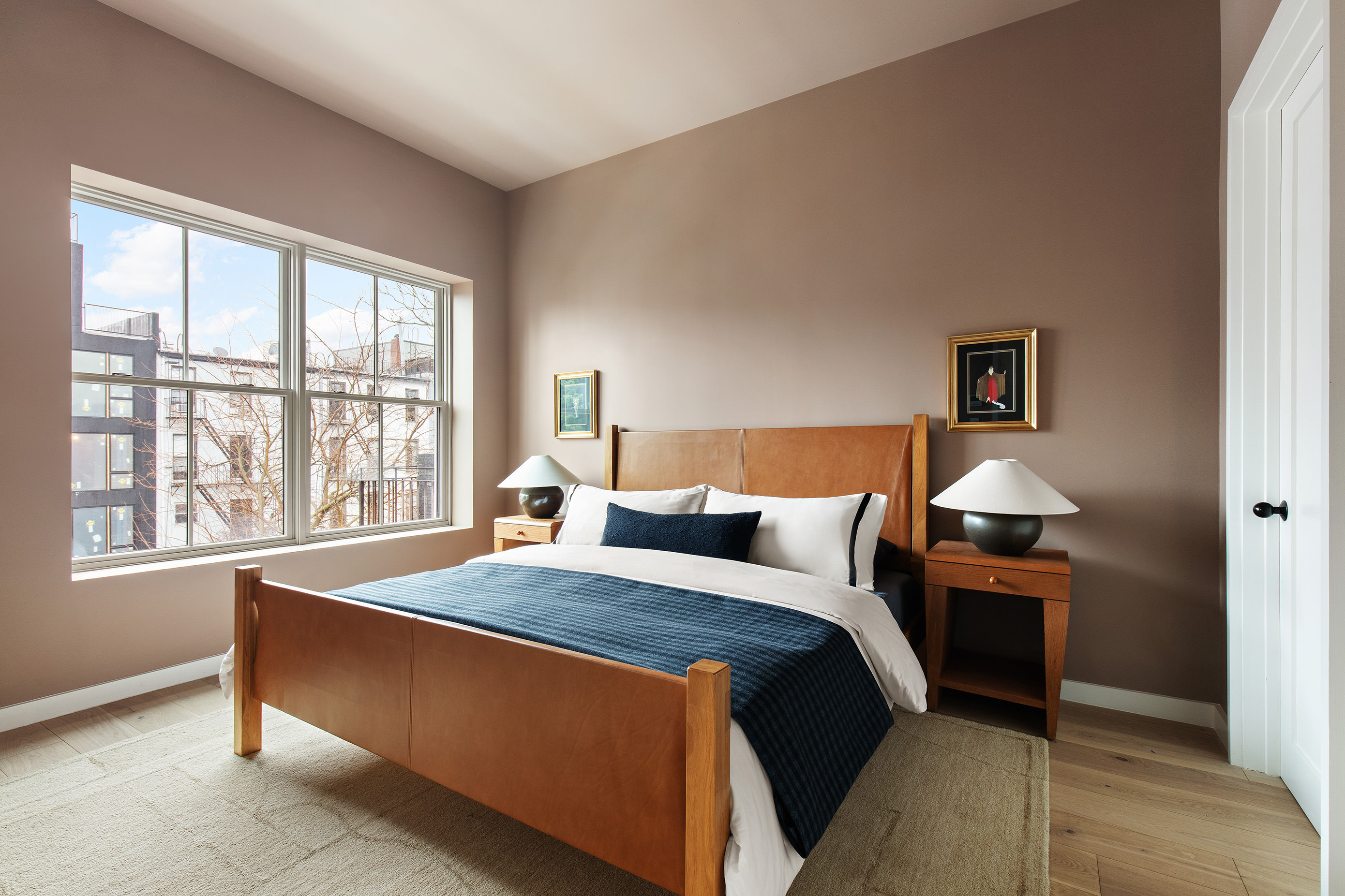 238 Degraw Street, Unit 3 Brooklyn, NY 11231 - Photo 6 of 17 a bed sitting in a bedroom next to a window