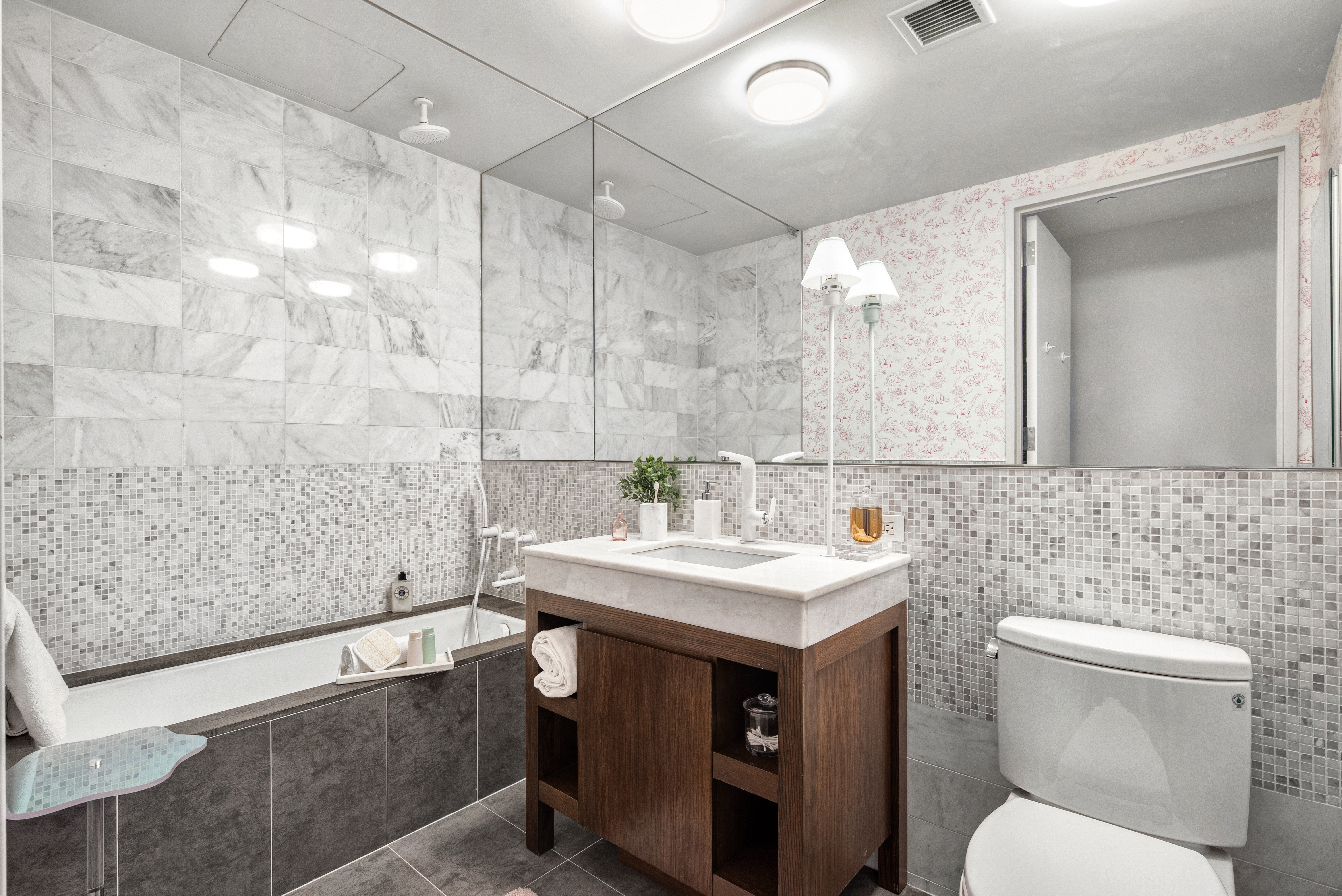 35 West 15th Street, Unit 14D Manhattan, NY 10011 - Photo 11 of 20 a bathroom with a sink a toilet and shower