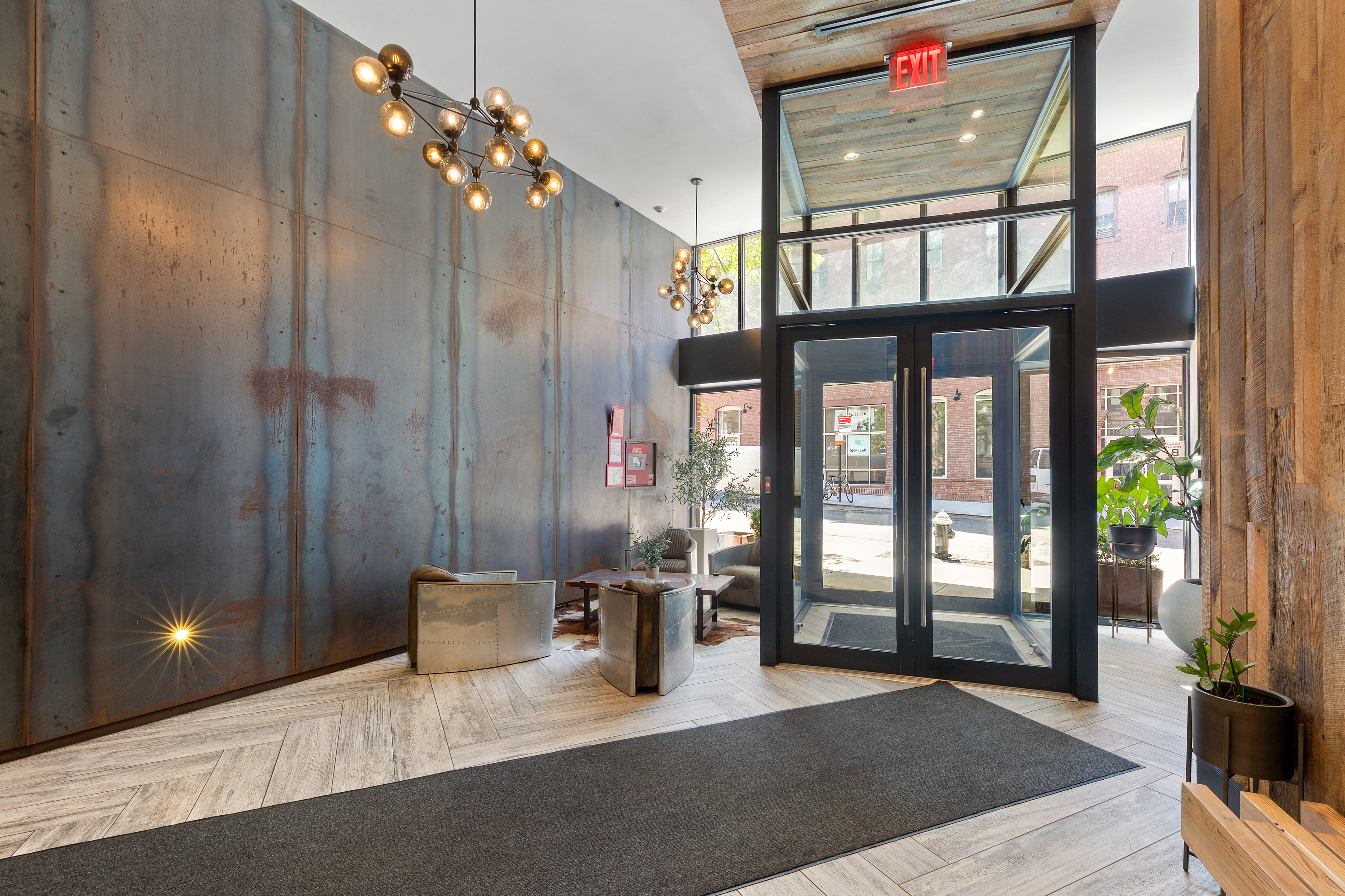 47 Bridge Street, Unit 5D Brooklyn, NY 11201 - Photo 11 of 21 a living room with furniture and a chandelier