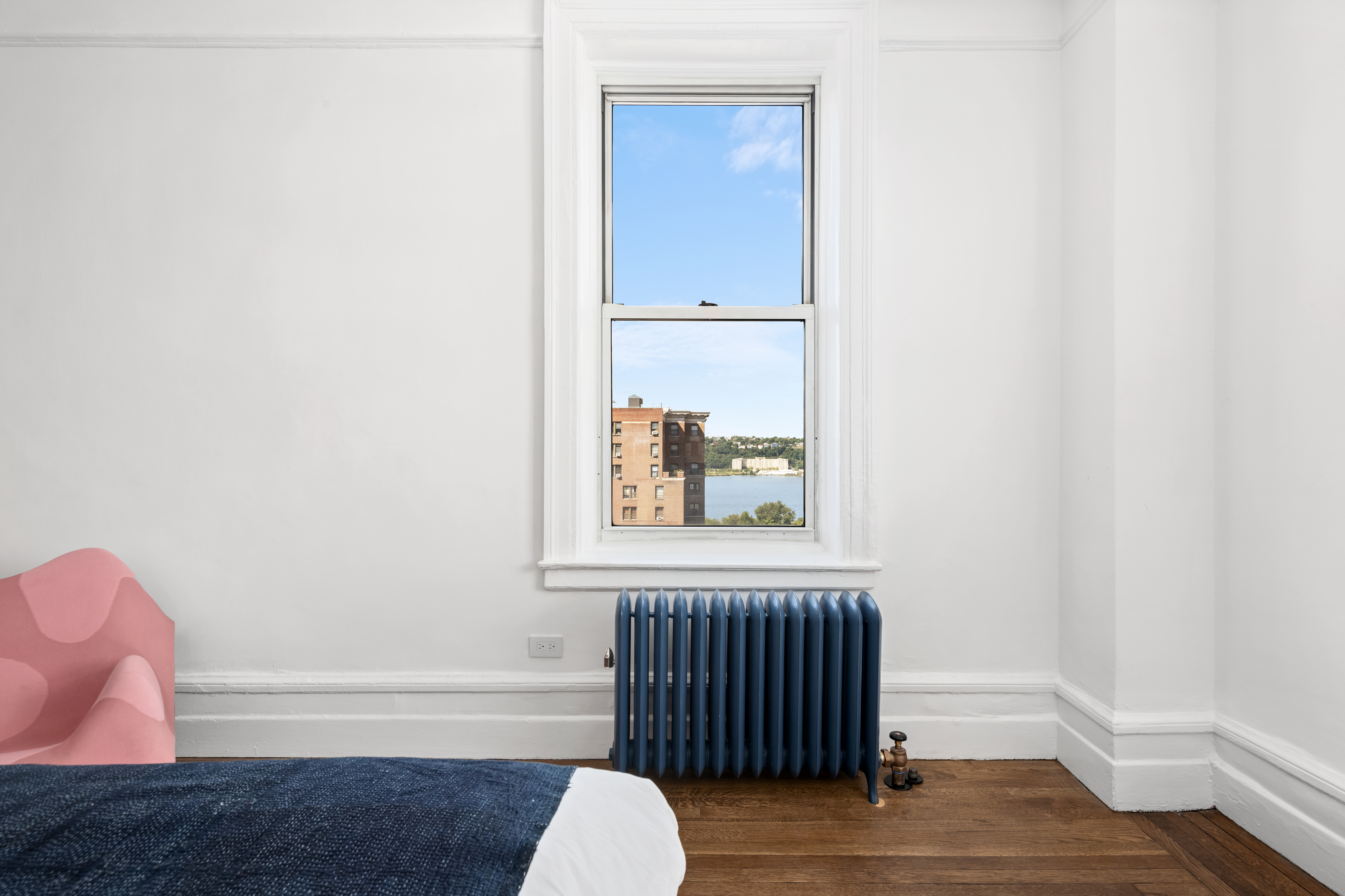 600 West 115th Street, Unit 1004 Manhattan, NY 10025 - Photo 11 of 13 a bathroom with a bathtub and a window