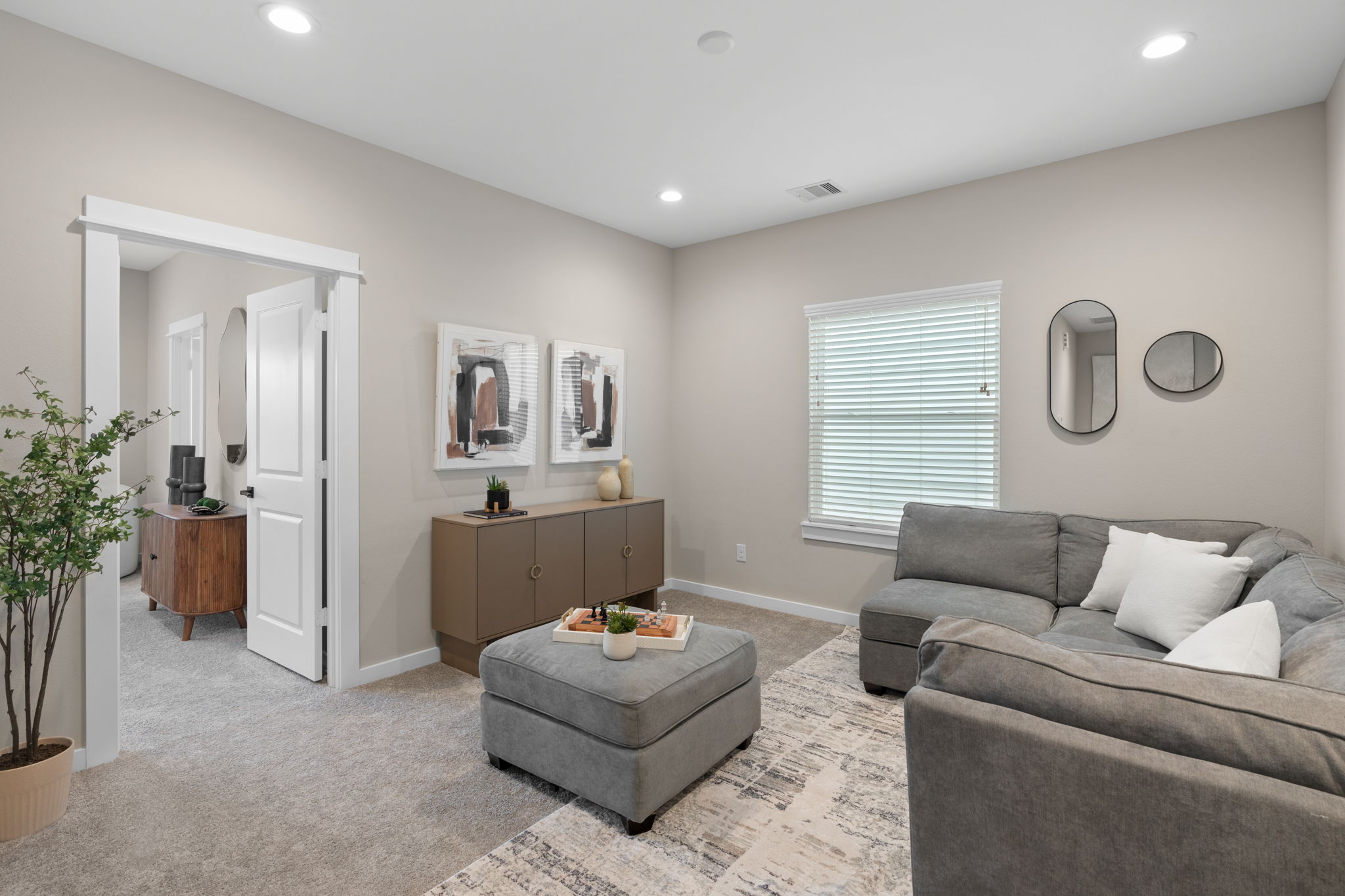 11303 Stonework Grv Lane Houston, TX 77076 - Photo 17 of 39 a living room with furniture and a couch