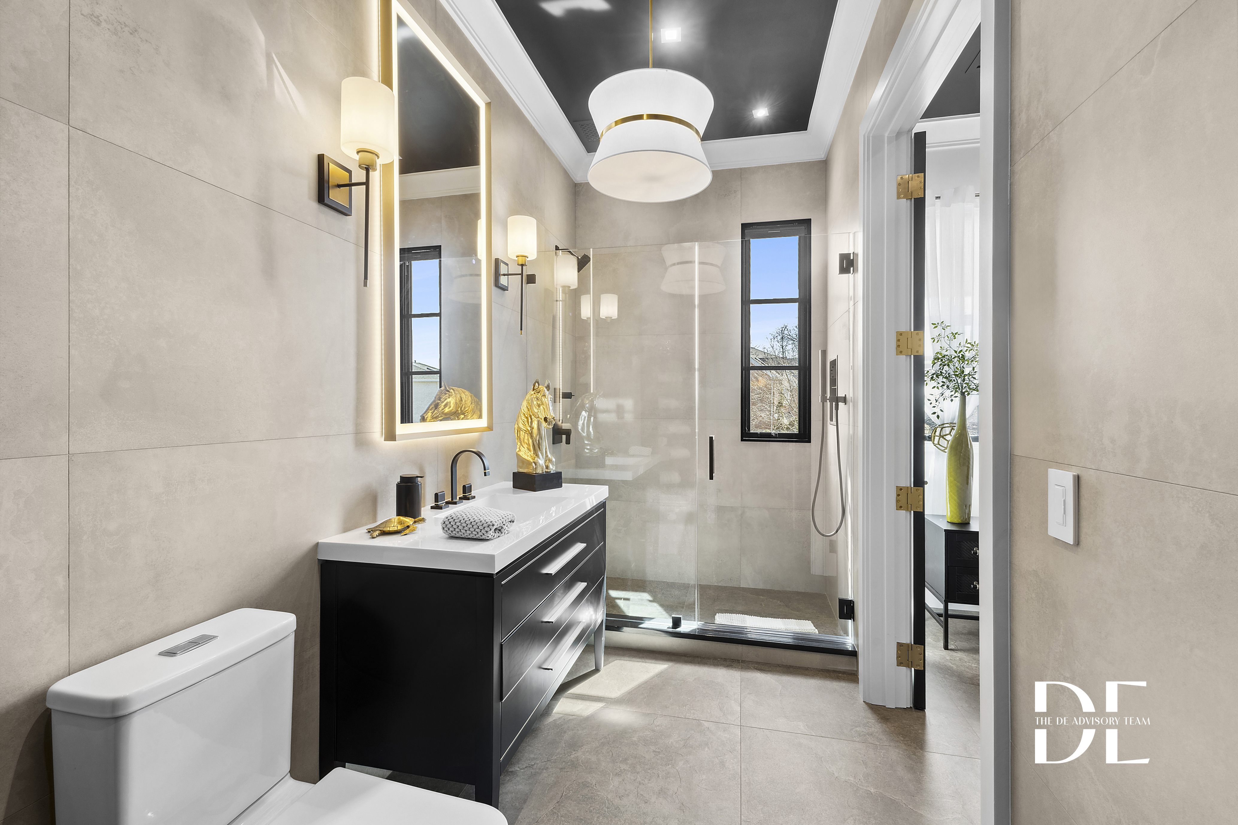 52 Nicolosi Loop Staten Island, NY 10312 - Photo 16 of 23 a bathroom with a sink vanity mirror and toilet