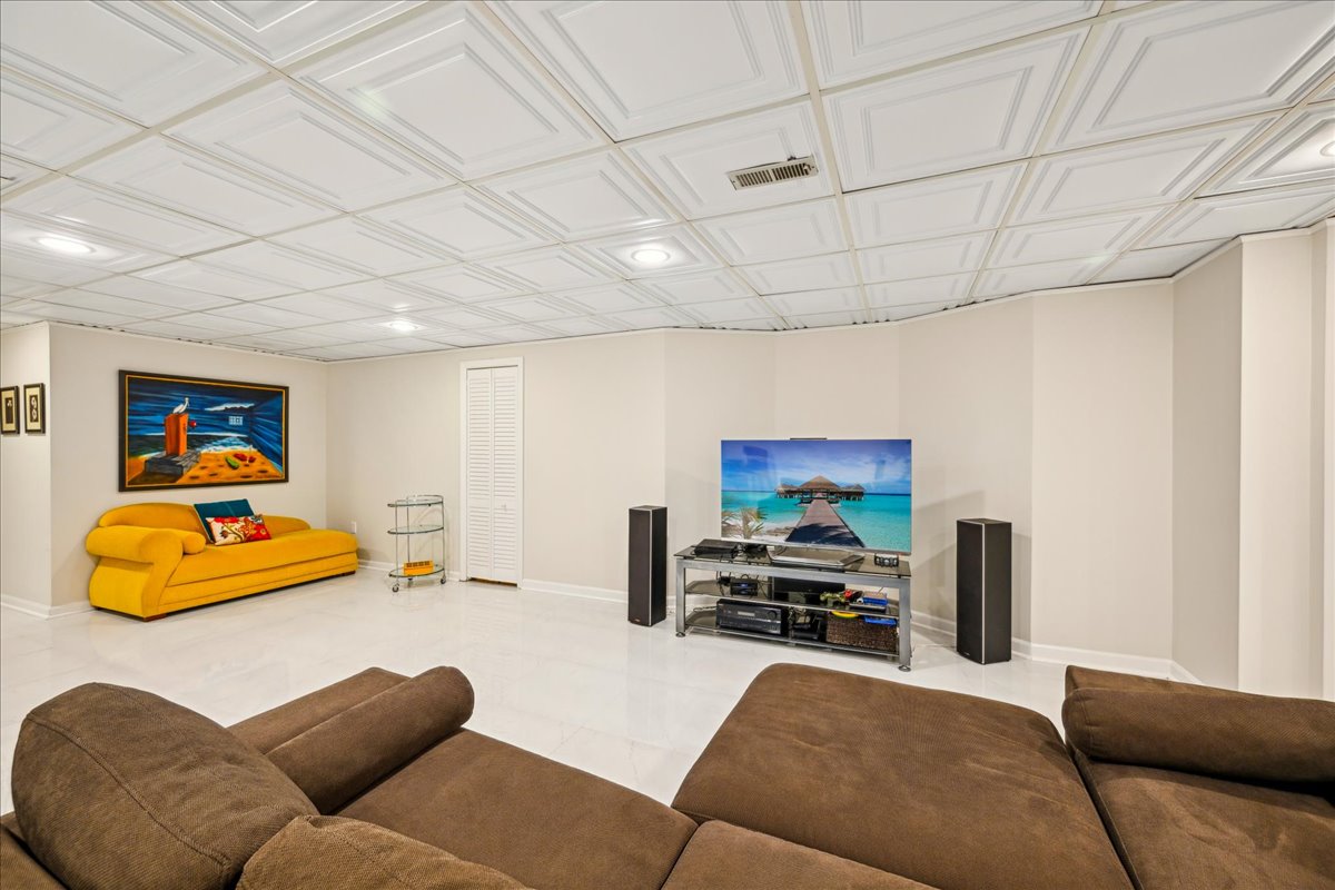 Johnston Drive Watchung, NJ 07069 - Photo 54 of 85 a living room with furniture and a flat screen tv