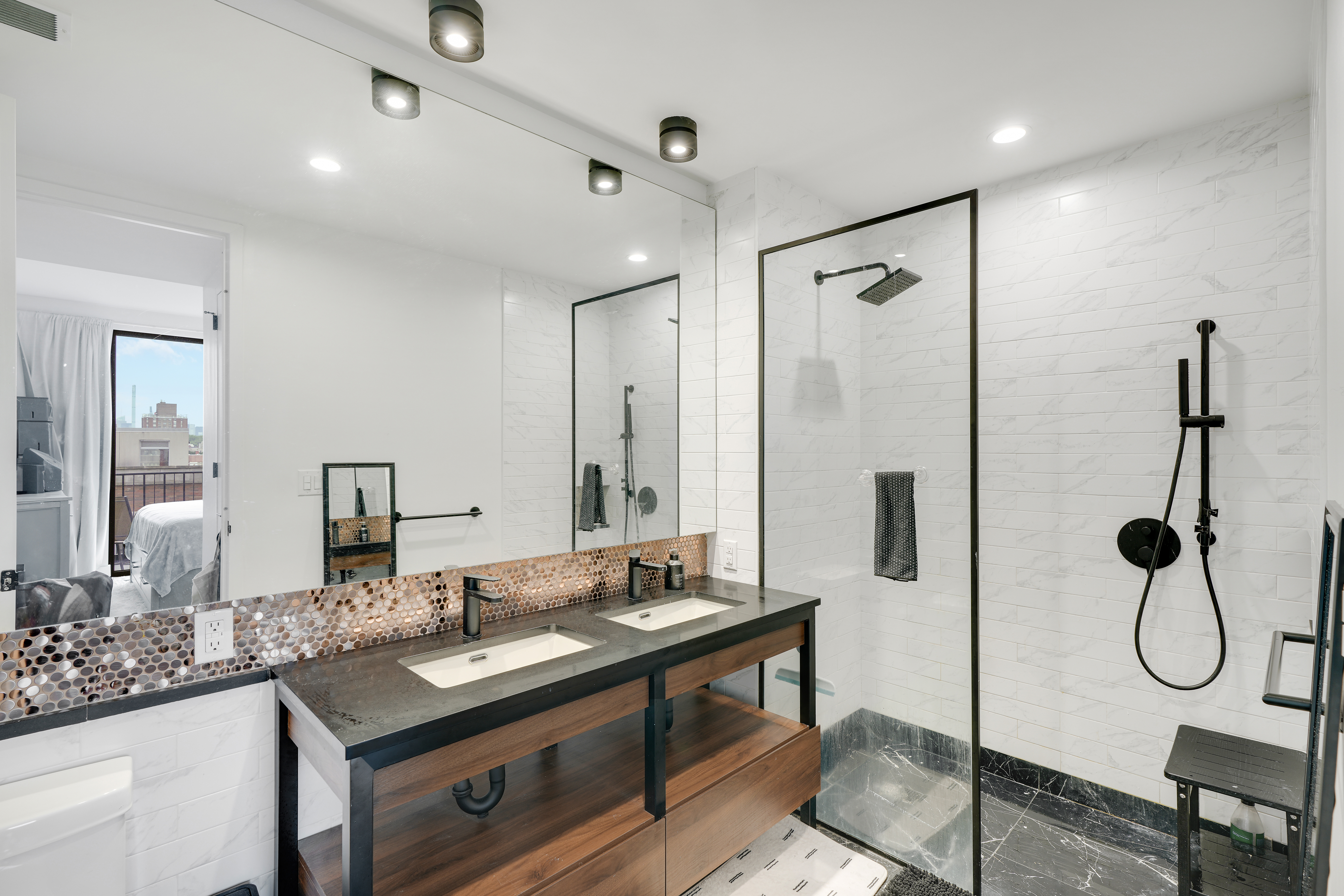 224 West 124th Street, Unit 305 Manhattan, NY 10027 - Photo 8 of 23 a bathroom with a granite countertop sink and a mirror
