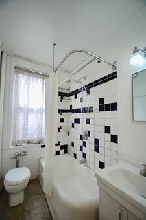 a bathroom with a sink toilet a shower and a bathtub