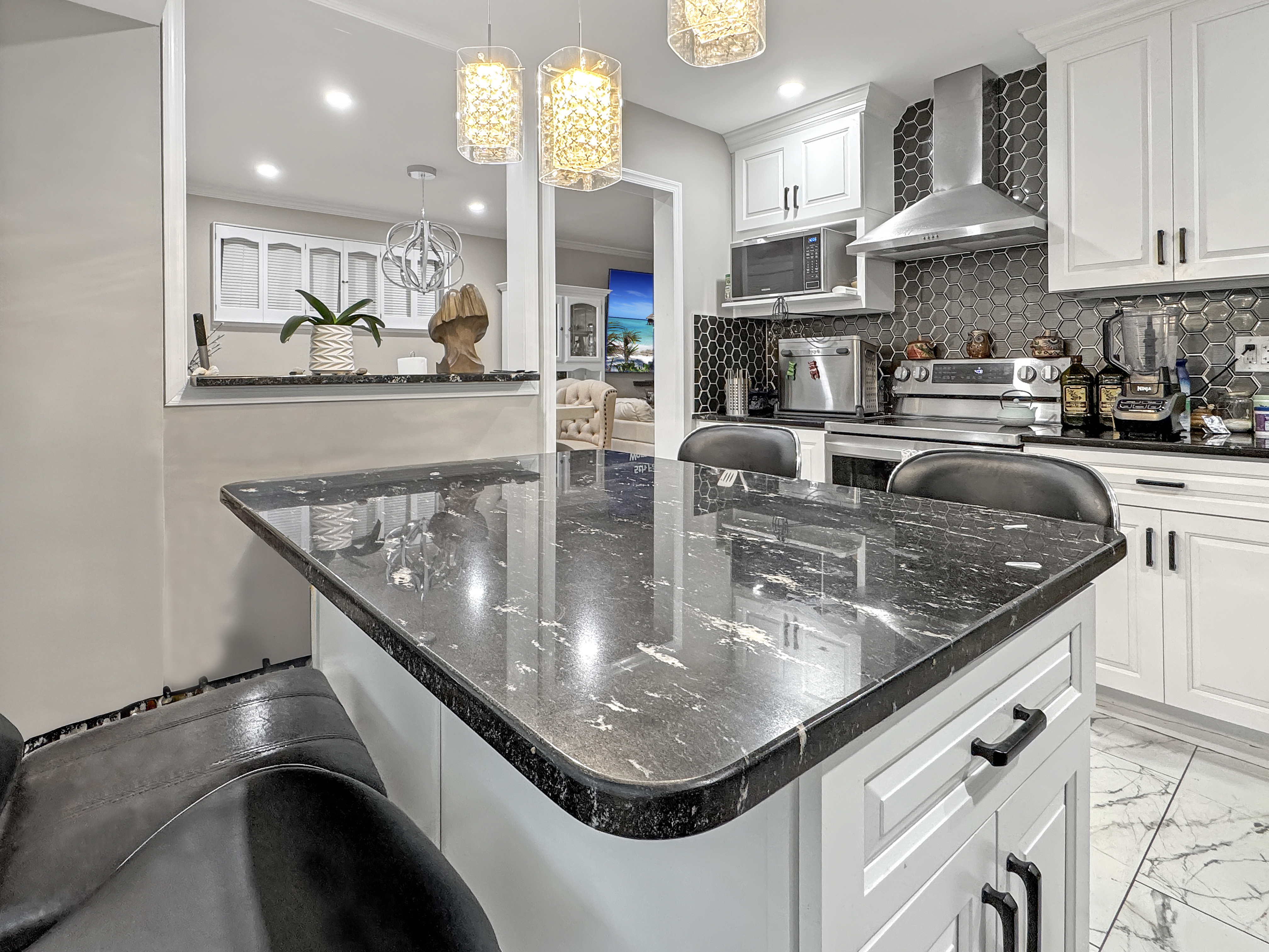2408 Lillian Drive Silver Spring, MD 20902 - Photo 10 of 40 a kitchen with stainless steel appliances granite countertop a sink a stove and a refrigerator