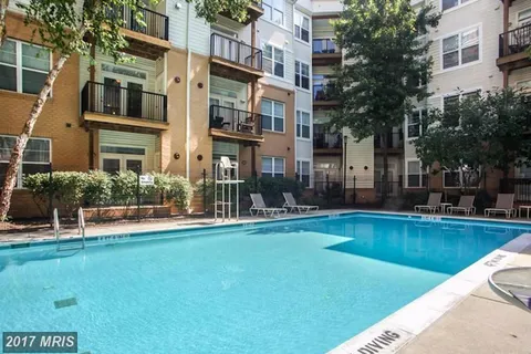 a view of a house with a swimming pool