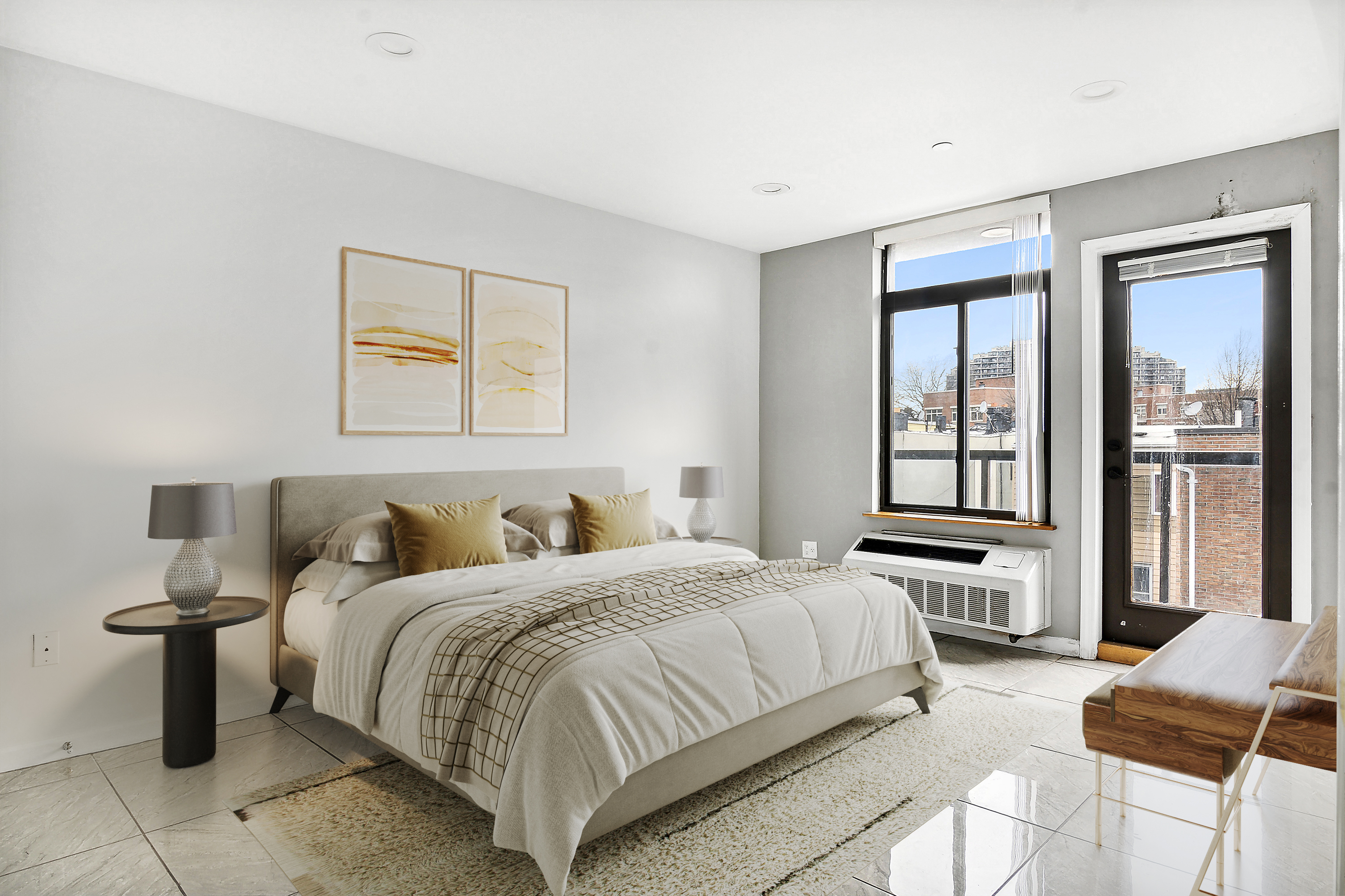 27-16 18th Street, Unit 3 Queens, NY 11102 - Photo 5 of 6 a bedroom with a bed and glass window