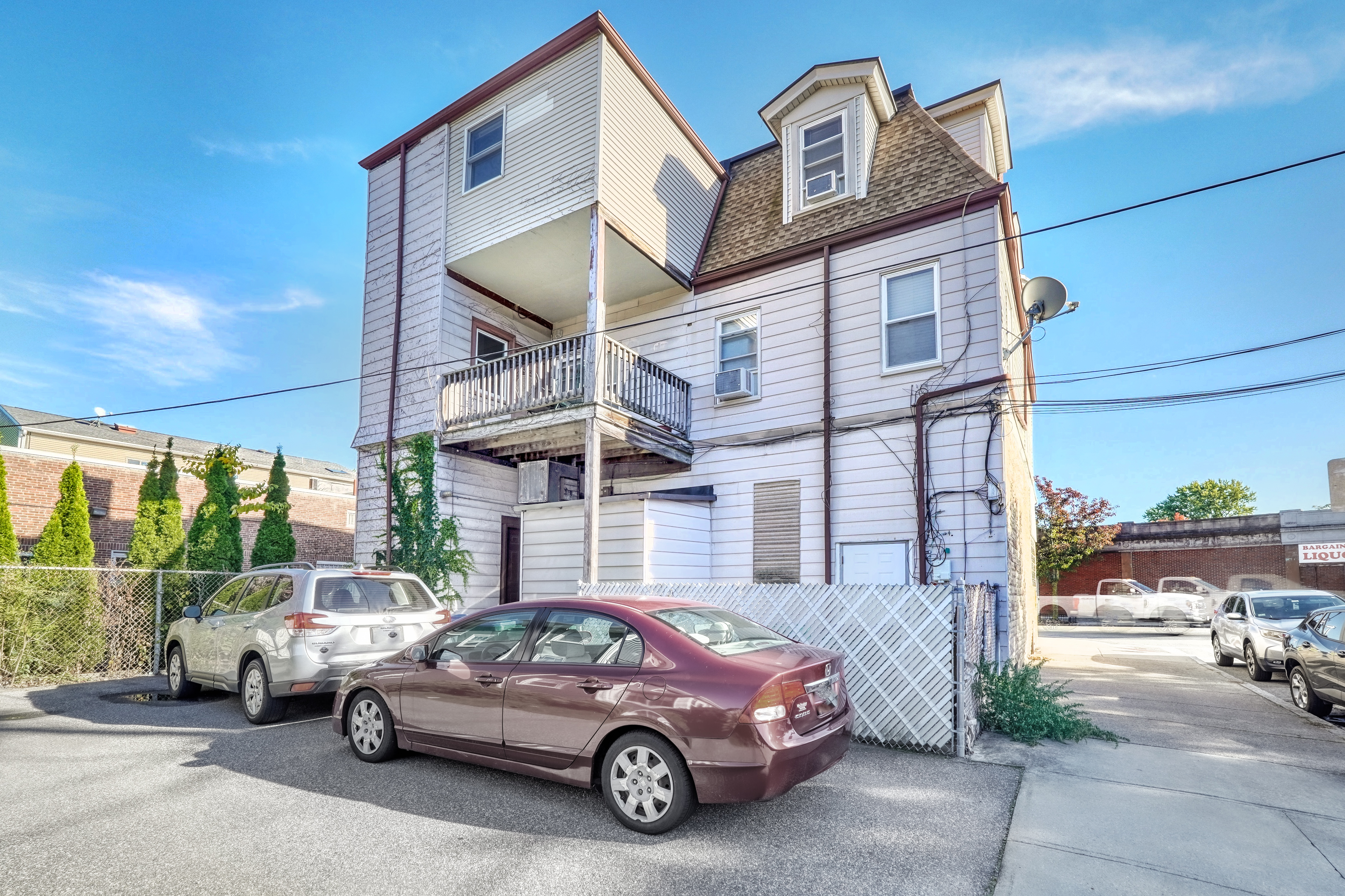 437 High Street Medford, MA 02155 - Photo 2 of 12 a view of a car parked in front of a building