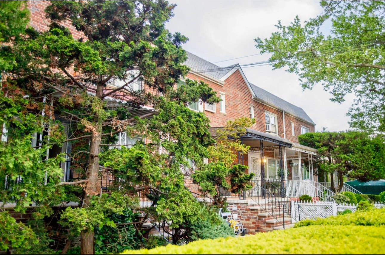 1729 East 54th Street, Unit 1 Brooklyn, NY 11234 - Photo 3 of 6 a view of a house with yard and sitting area