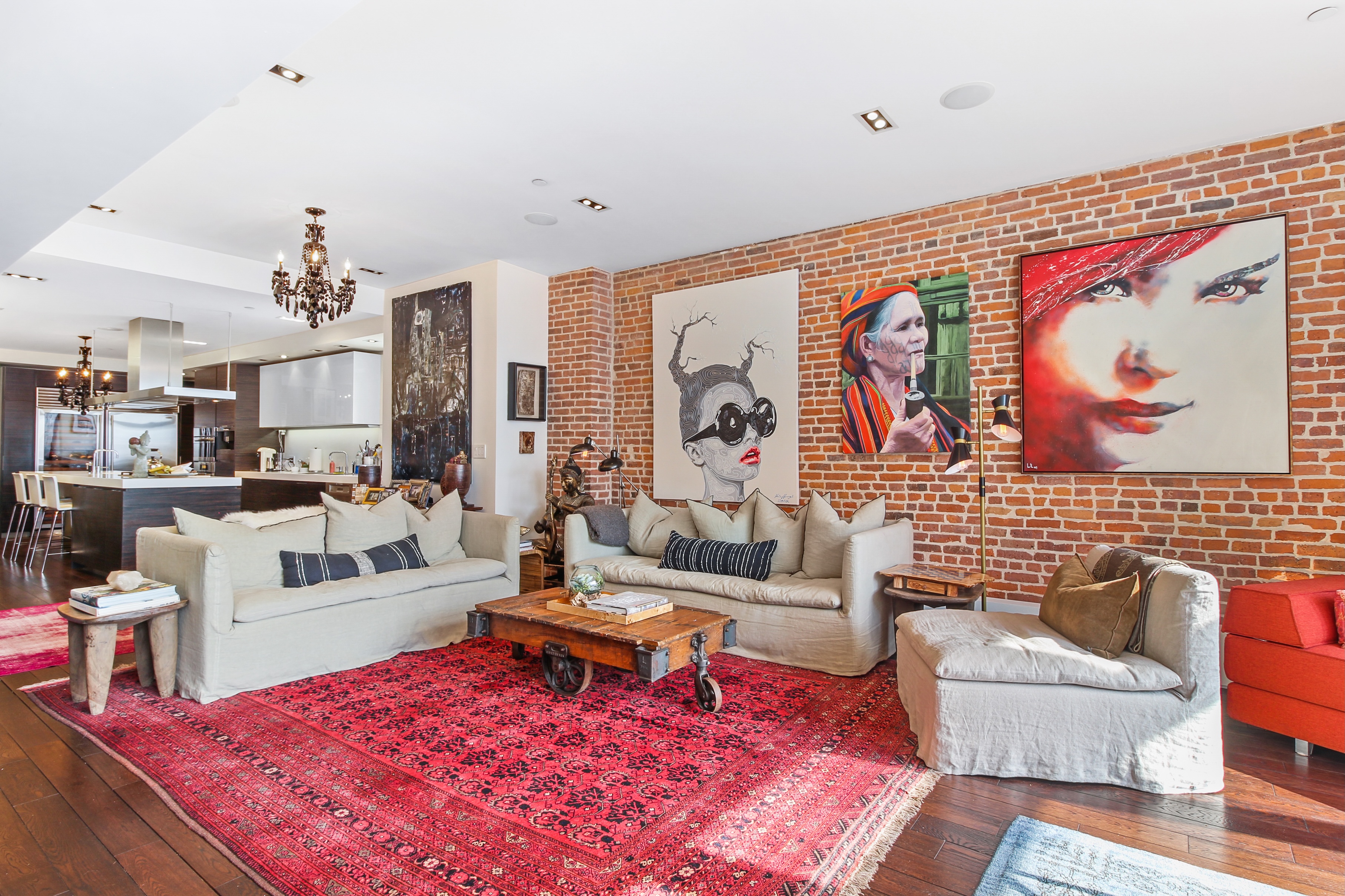 405 Broadway, Unit 4 Manhattan, NY 10013 - Photo 4 of 19 a living room with furniture and wooden floor