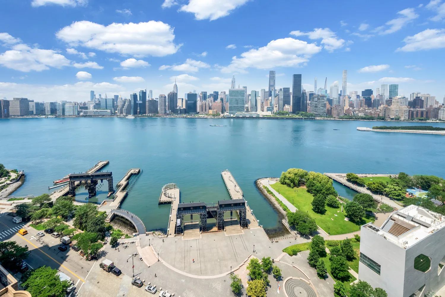 an aerial view of a house with a lake view