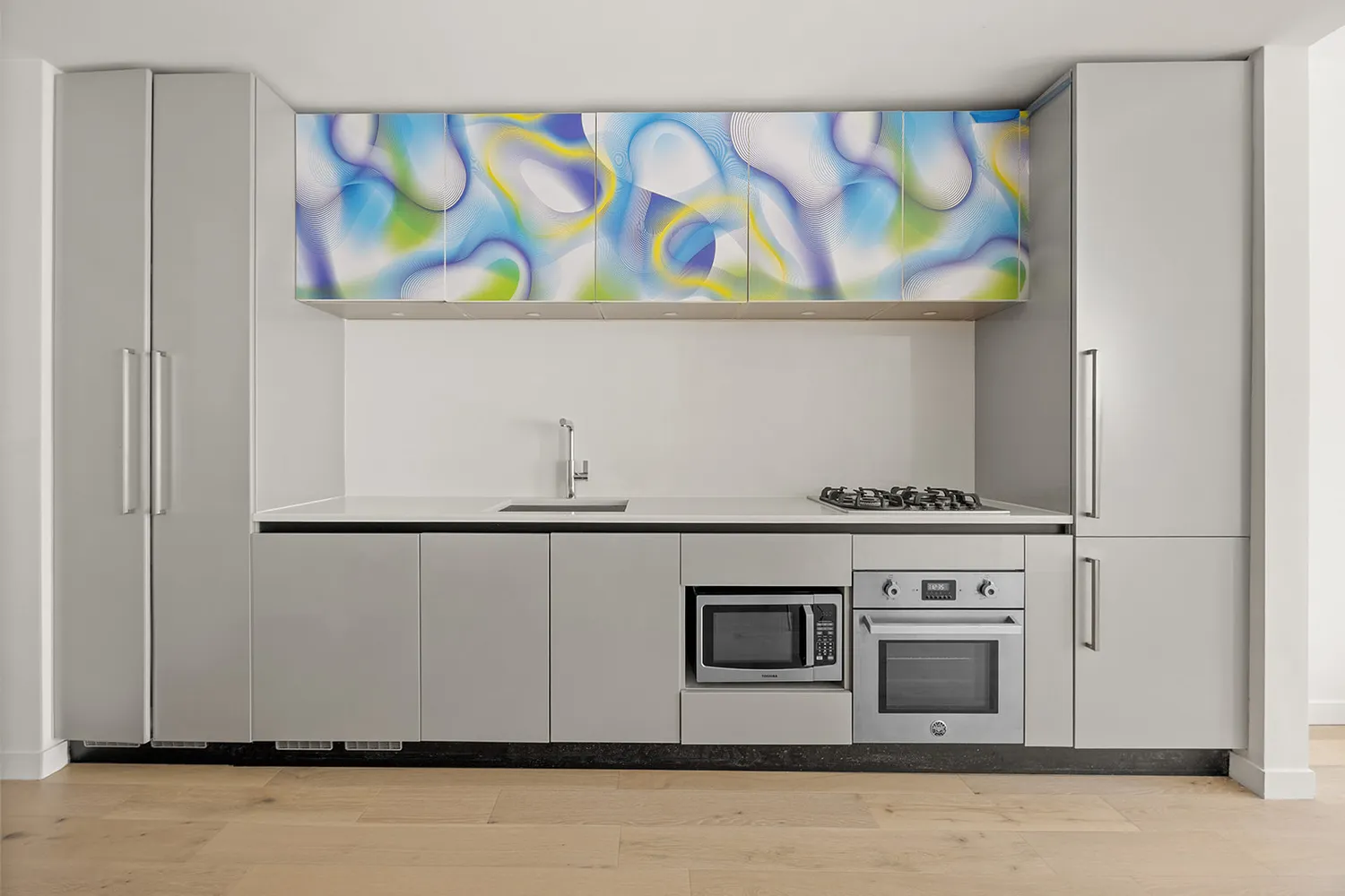 a white stove top oven sitting inside of a kitchen