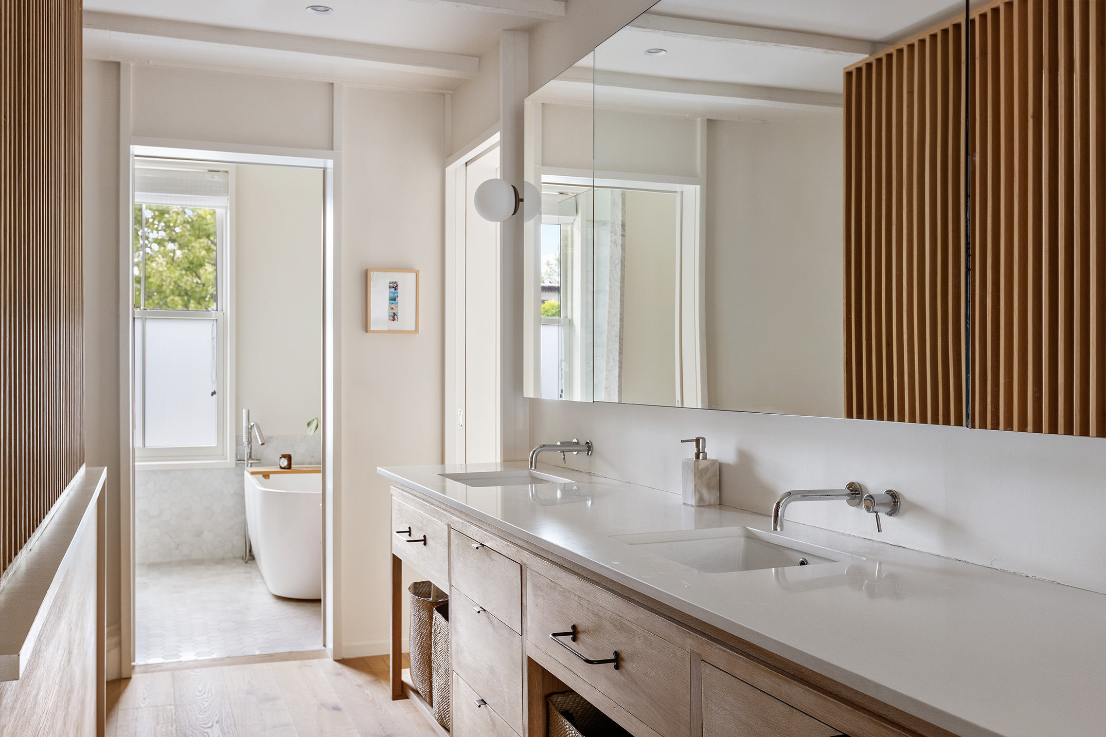 479 Henry Street Brooklyn, NY 11231 - Photo 20 of 30 a bathroom with a double vanity sink and a mirror