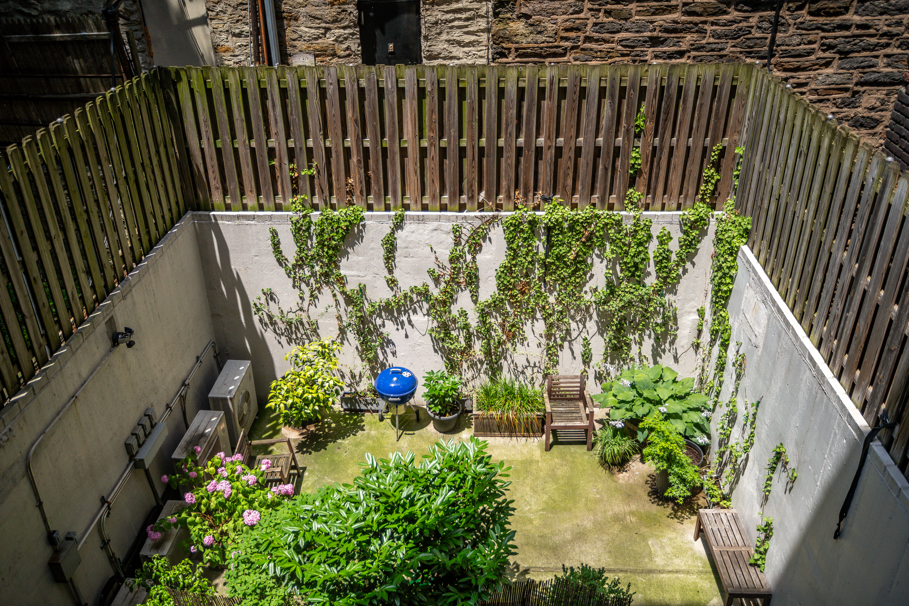 753 St Nicholas Avenue, Unit 2B Manhattan, NY 10031 - Photo 9 of 10 a view of a backyard of the house