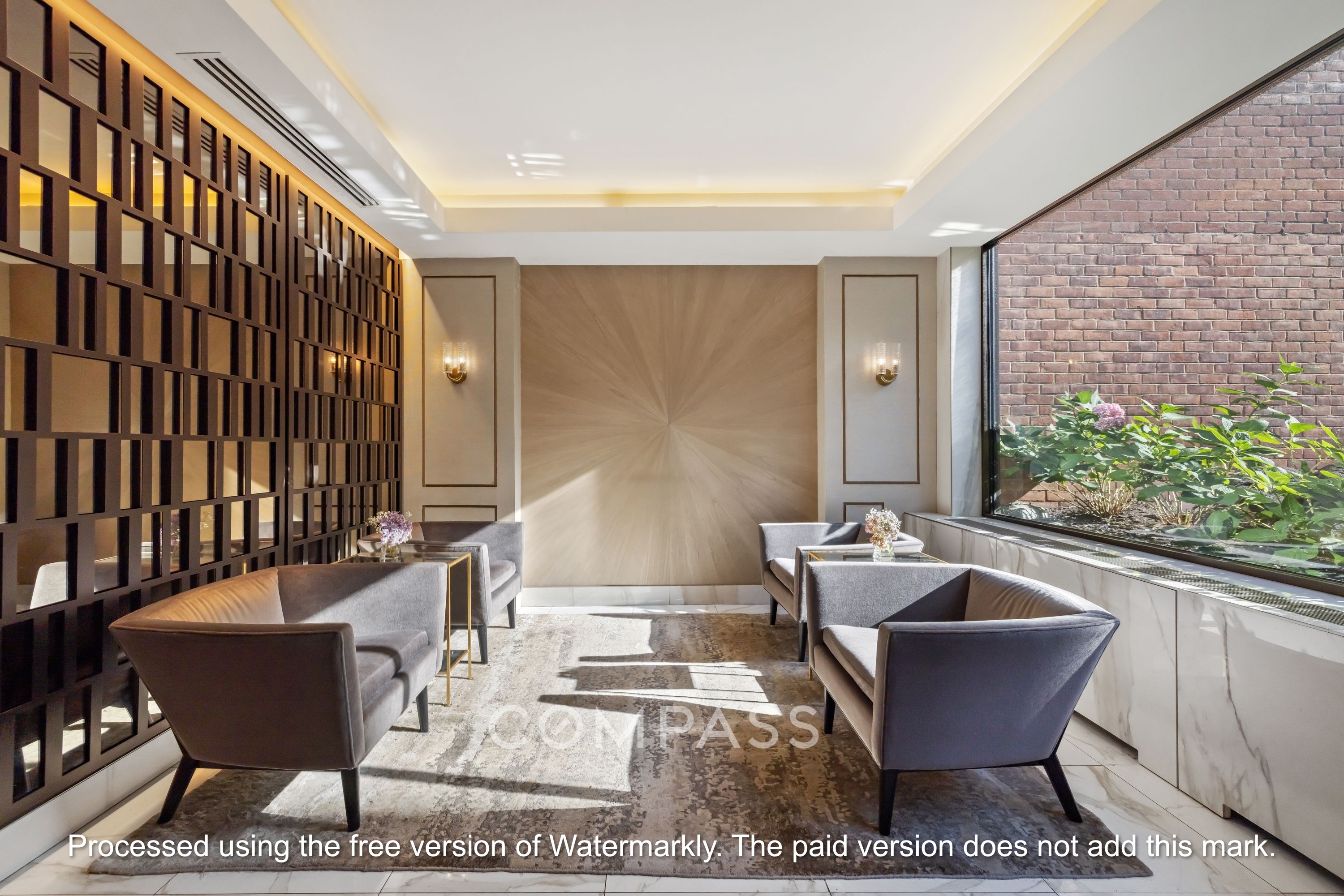 345 East 81st Street, Unit 8G Manhattan, NY 10028 - Photo 14 of 17 a living room with furniture and a potted plant