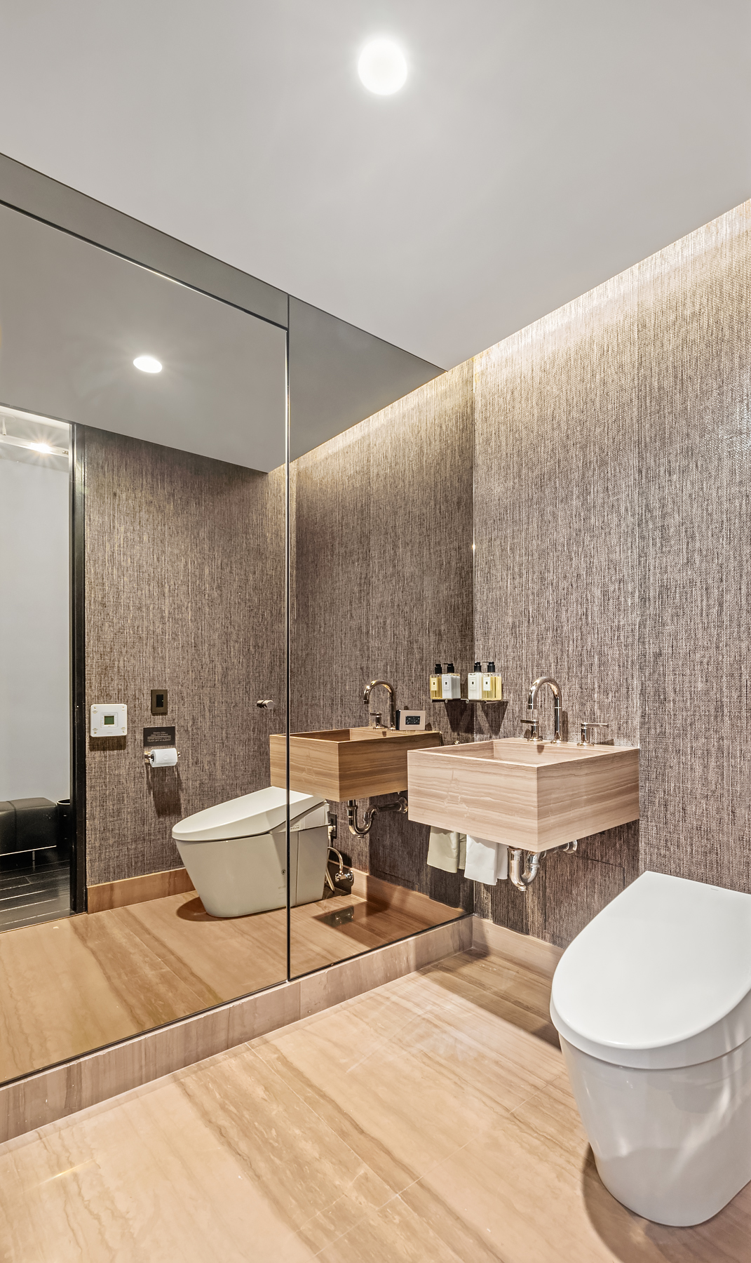 279 Central Park West, Unit 8B Manhattan, NY 10024 - Photo 12 of 15 a bathroom with a white toilet and a sink