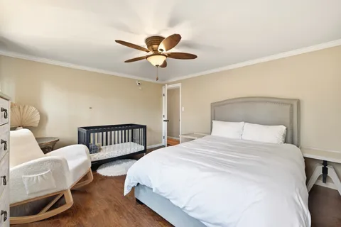 a bathroom with a sink vanity and toilet