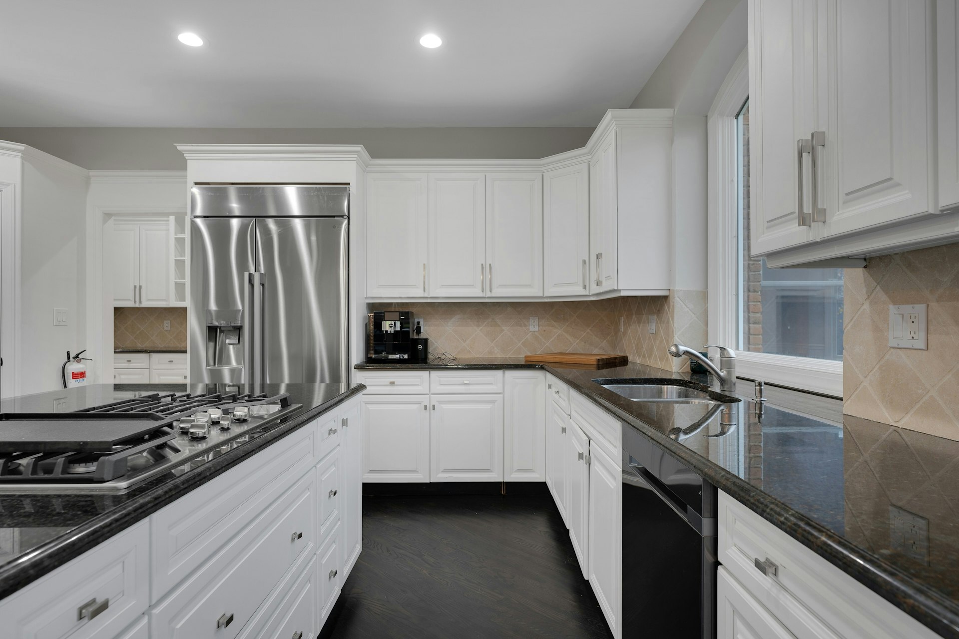 3 Kensington Court Warren, NJ 07059 - Photo 24 of 66 a kitchen with stainless steel appliances granite countertop a sink stove and refrigerator