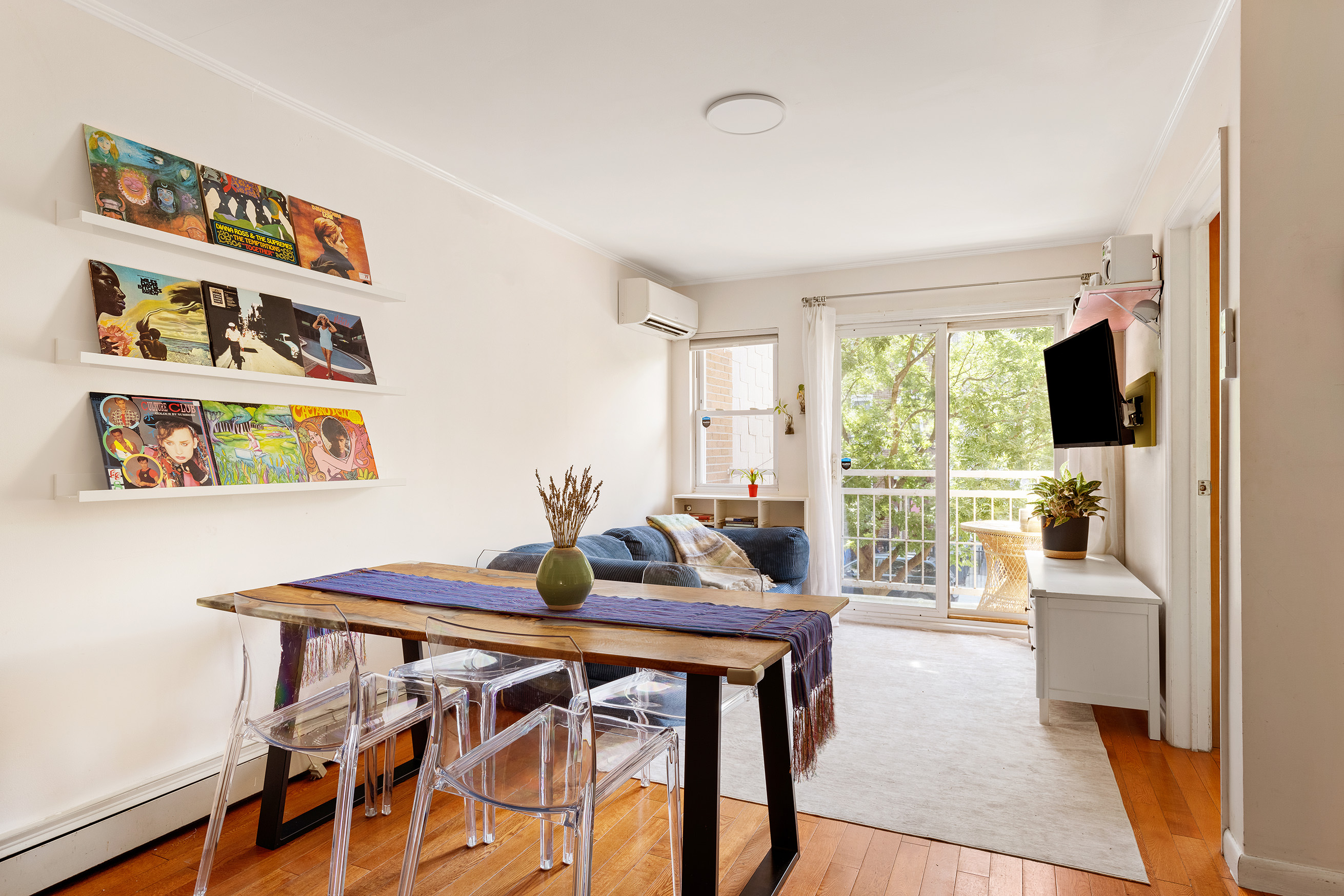 a view of a dining room with furniture window and outside view