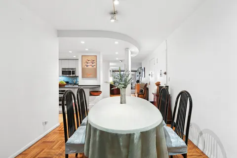 a view of a dining room with furniture