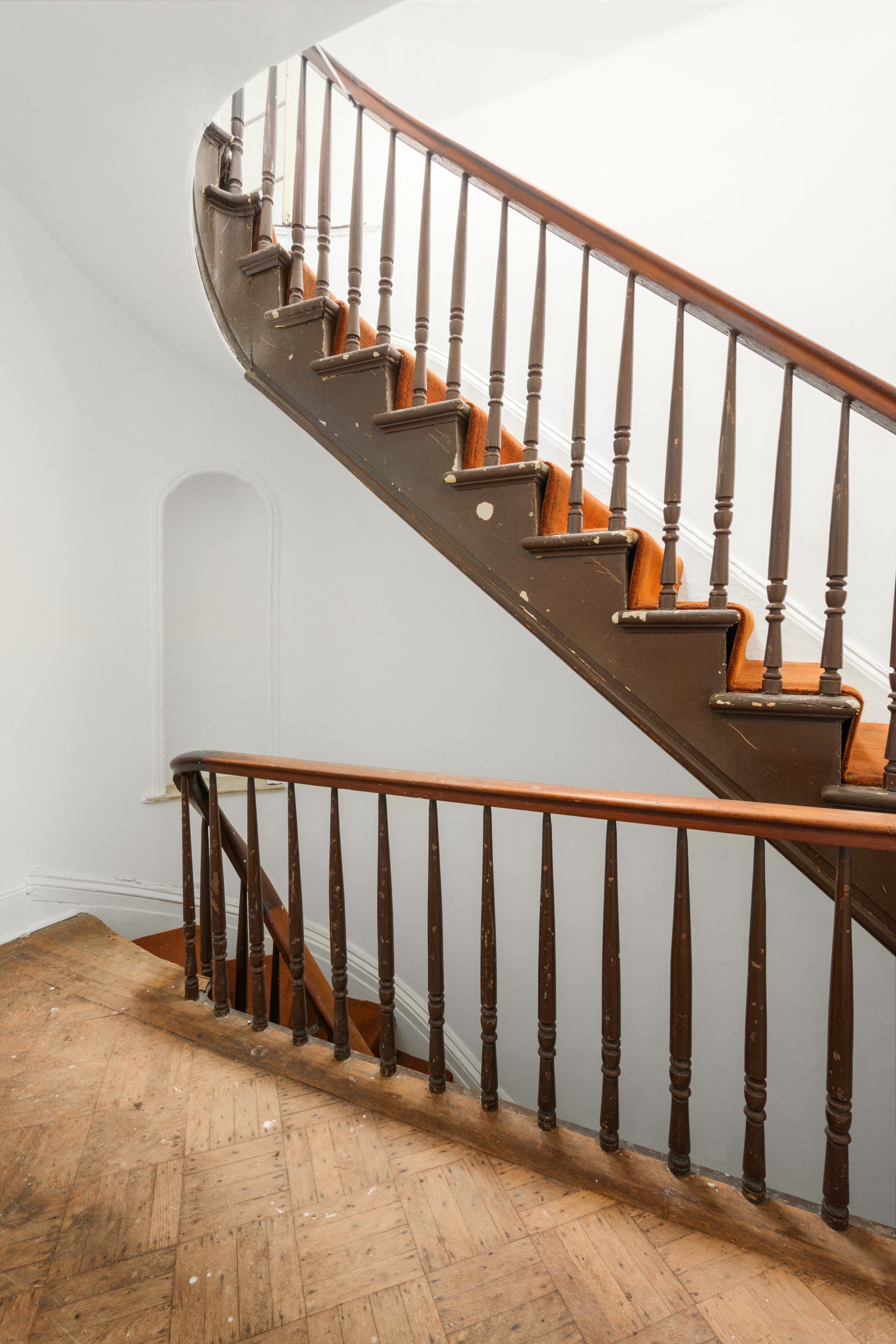 217 Dean Street Brooklyn, NY 11217 - Photo 8 of 26 a view of staircase with railing and white walls