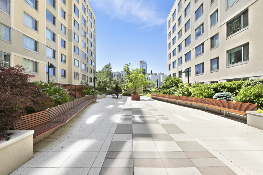 40 West 116th Street, Unit A406 Manhattan, NY 10026 - Photo 12 of 14 a view of a building with garden