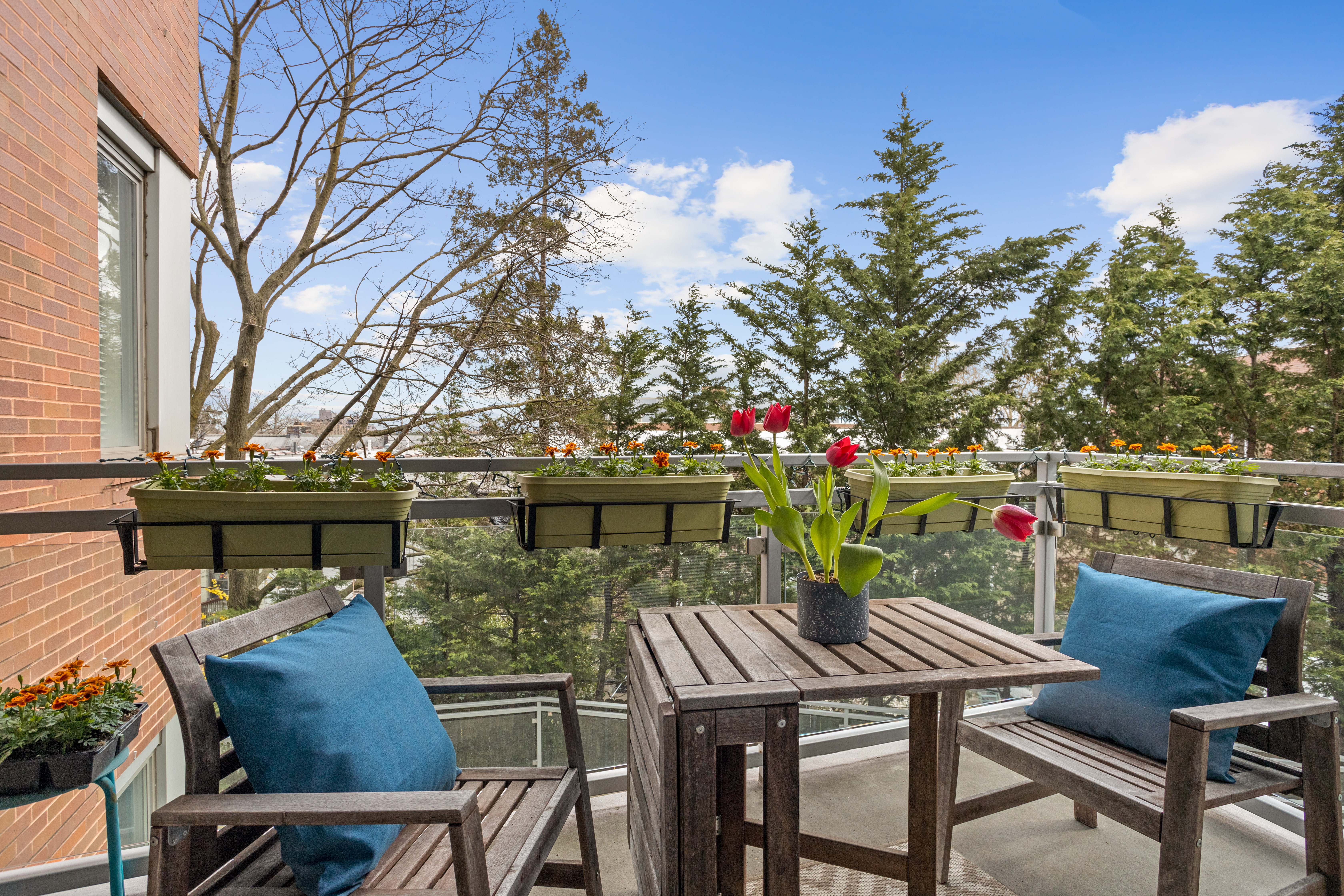 35 McDonald Avenue, Unit 2B Brooklyn, NY 11218 - Photo 8 of 10 a view of a chairs and table on the deck